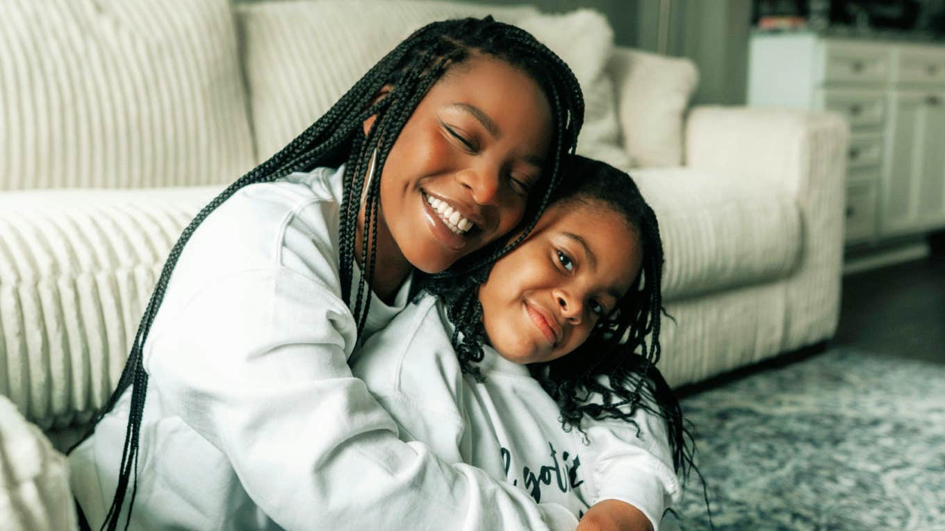 Mother who never had a good role model, raising a happy child. 