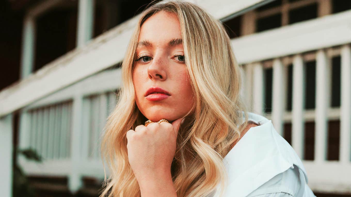 Heartbroken person sitting alone showing the art of starting over and hidden truths behind why being ghosted cuts so deep.