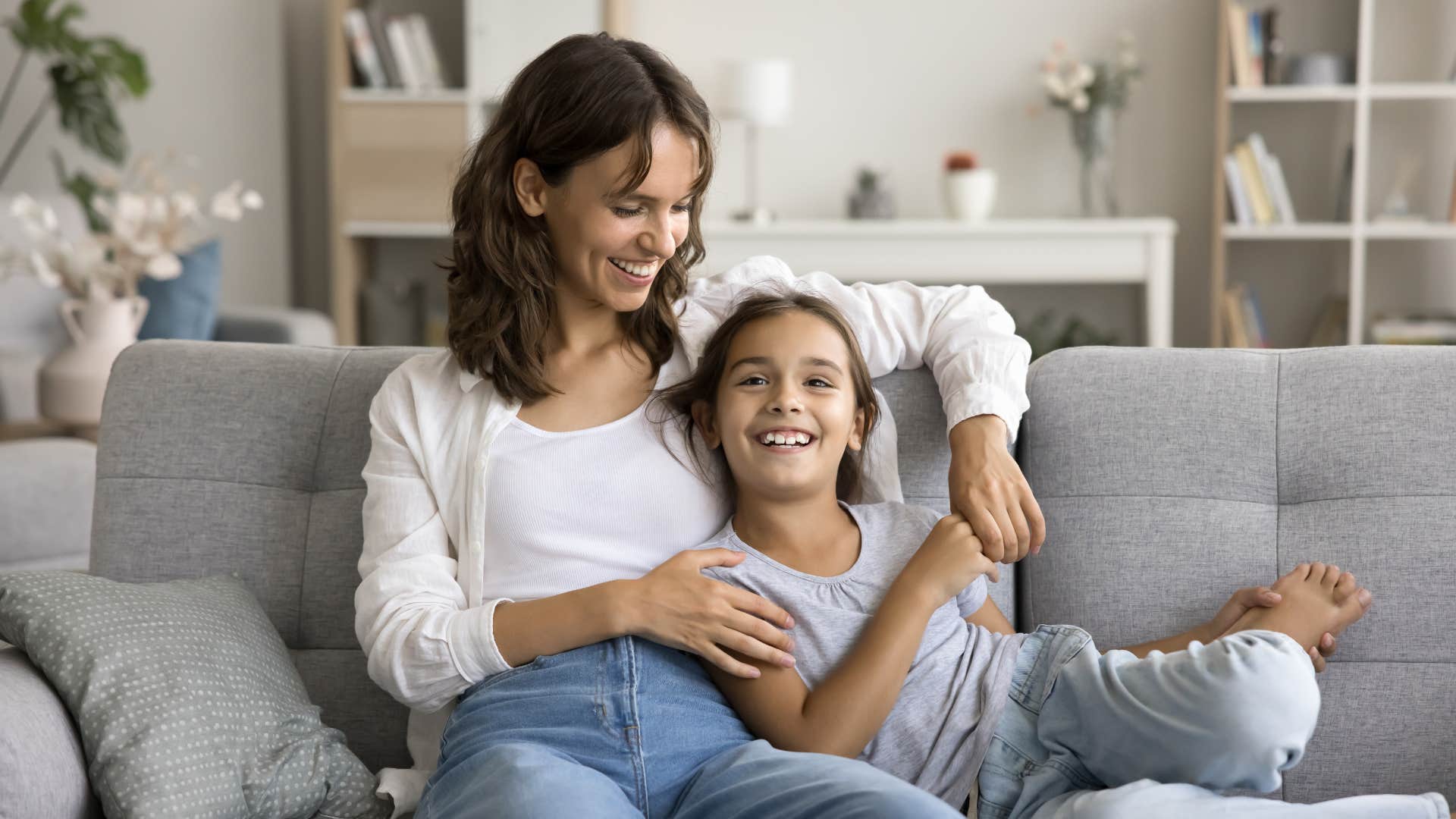 woman raising a confident daughter by telling her the most important relationship is with herself