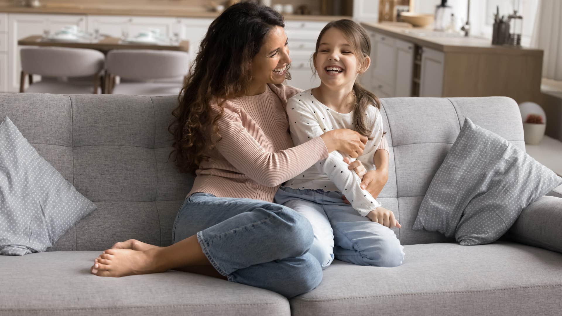 woman who is raising a confident daughter by telling her she doesn't need to stay in a relationship because she's scared to be alone
