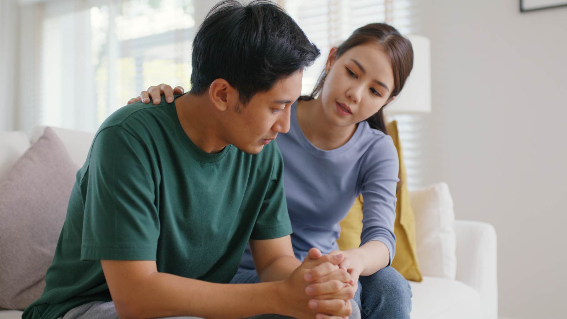 man telling his partner he's fine