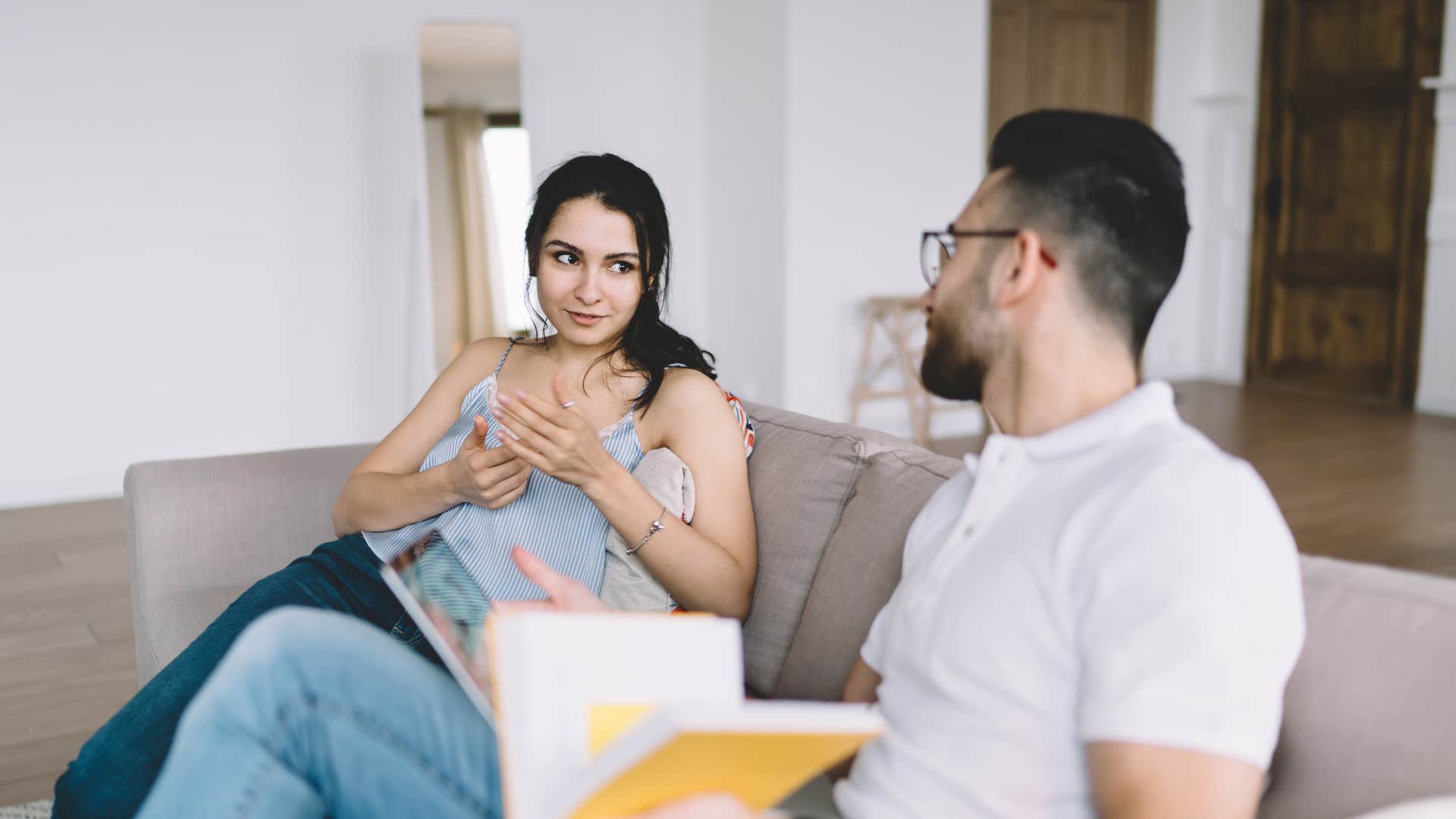 woman remaining calm talking to mansplainer