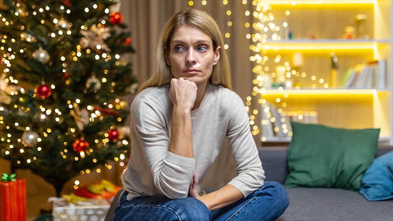 broke woman stressed about affording christmas gifts
