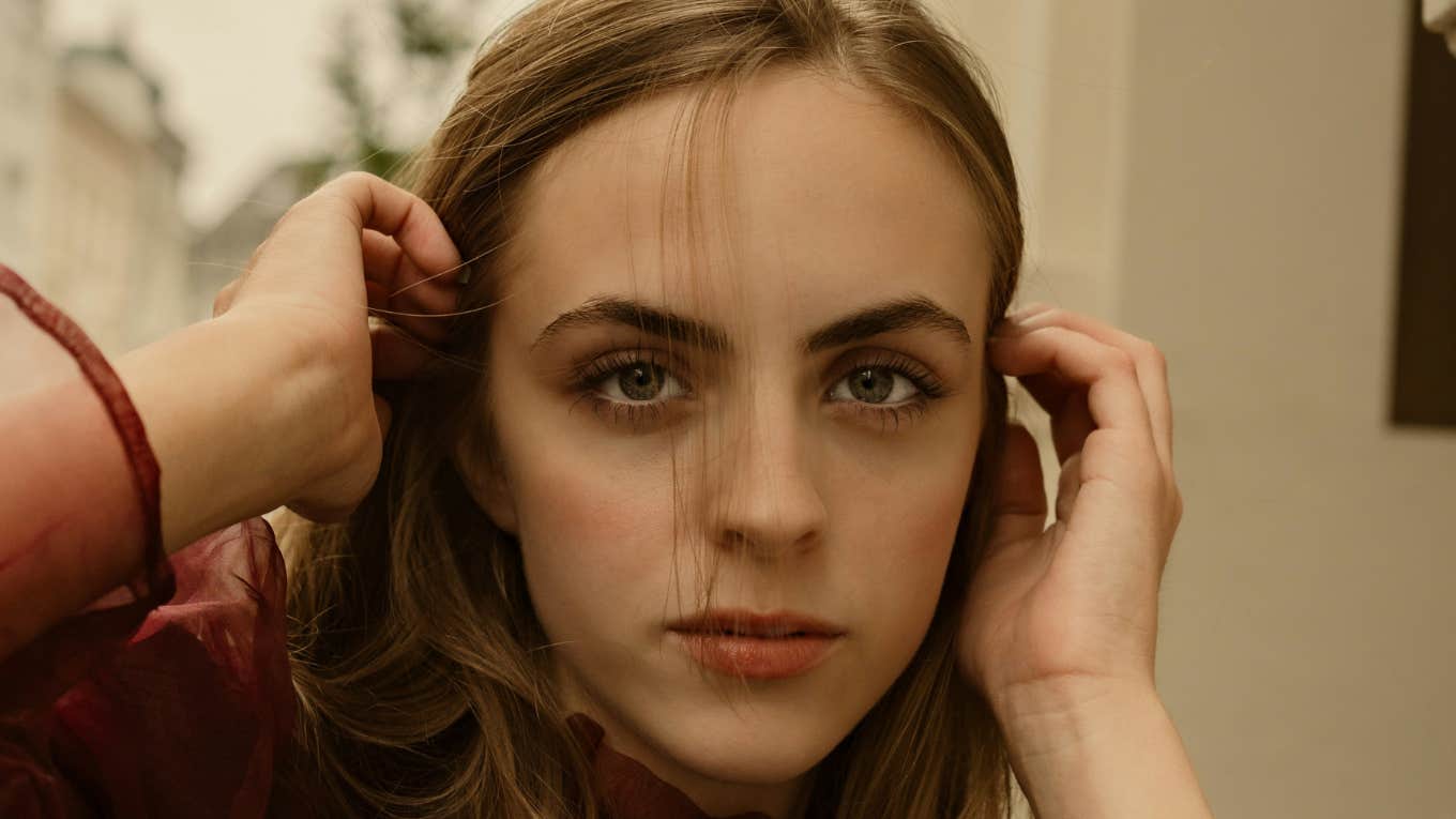 Woman silences toxic drama by staying calm.