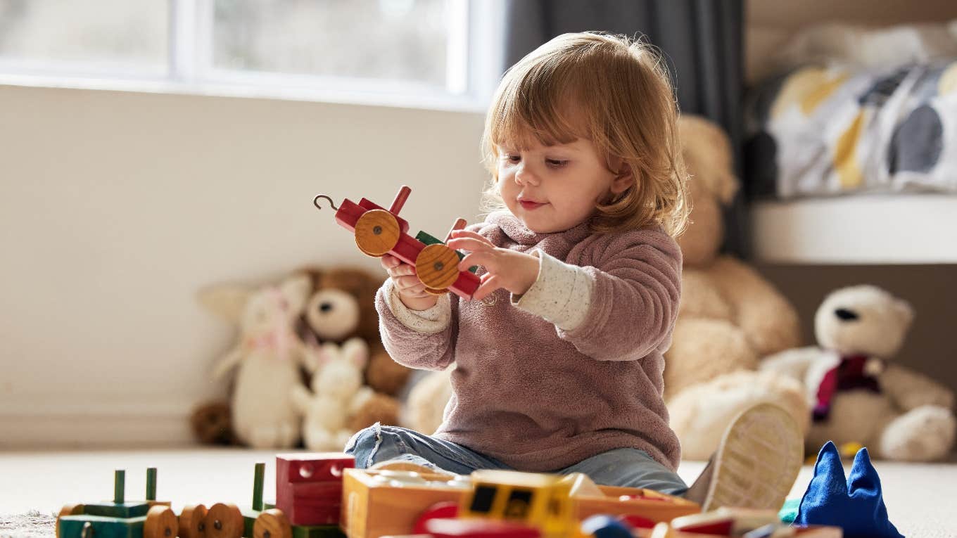 child playing with toys