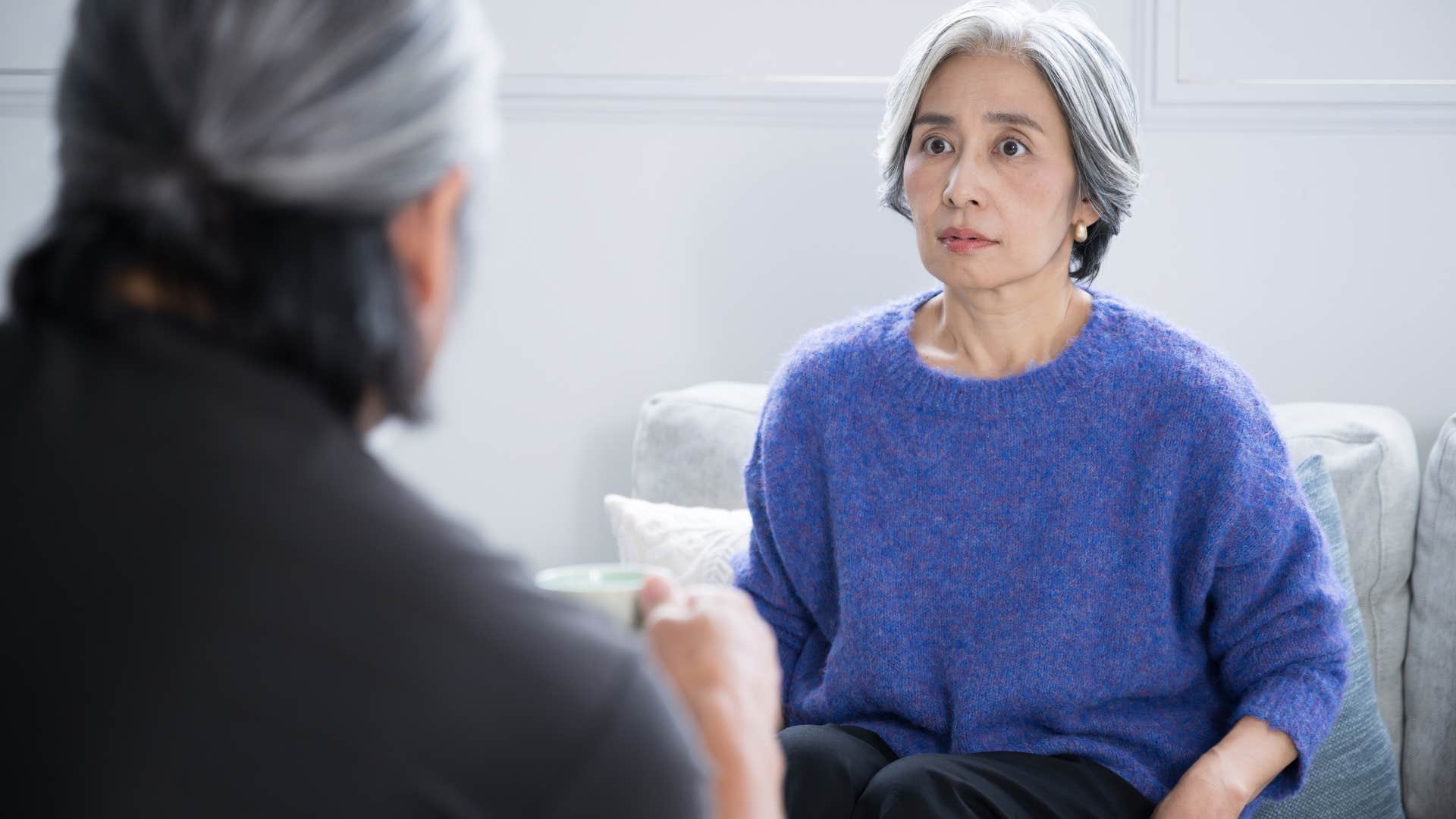 woman bringing up resolved issues with her husband