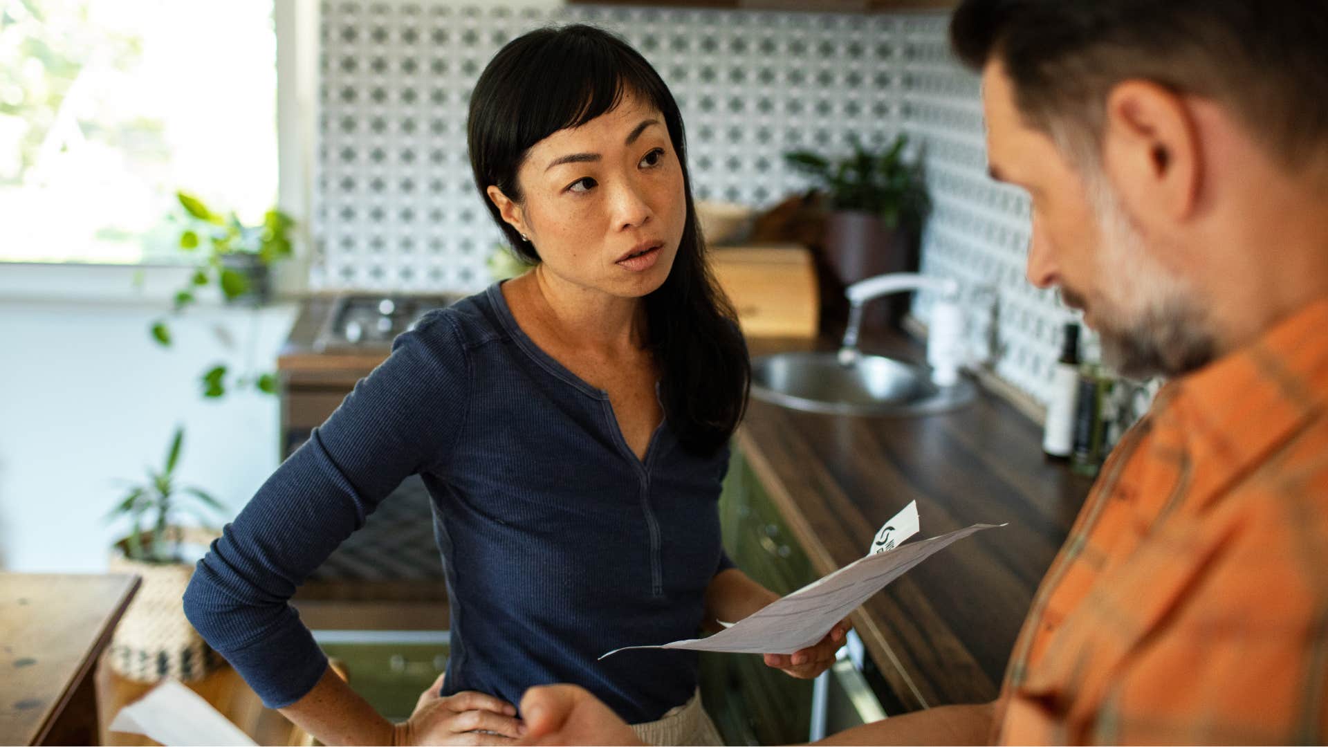 woman comparing her upset husband to others