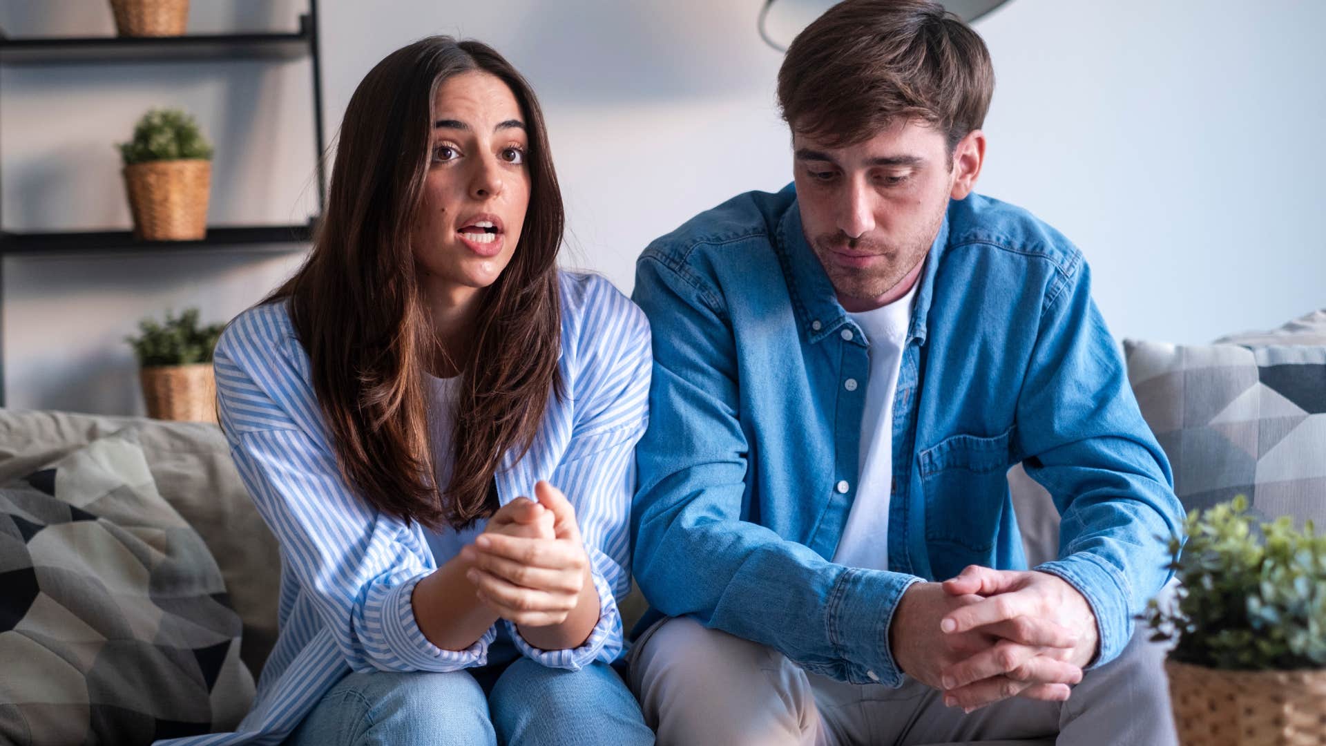 woman correcting her husband around others
