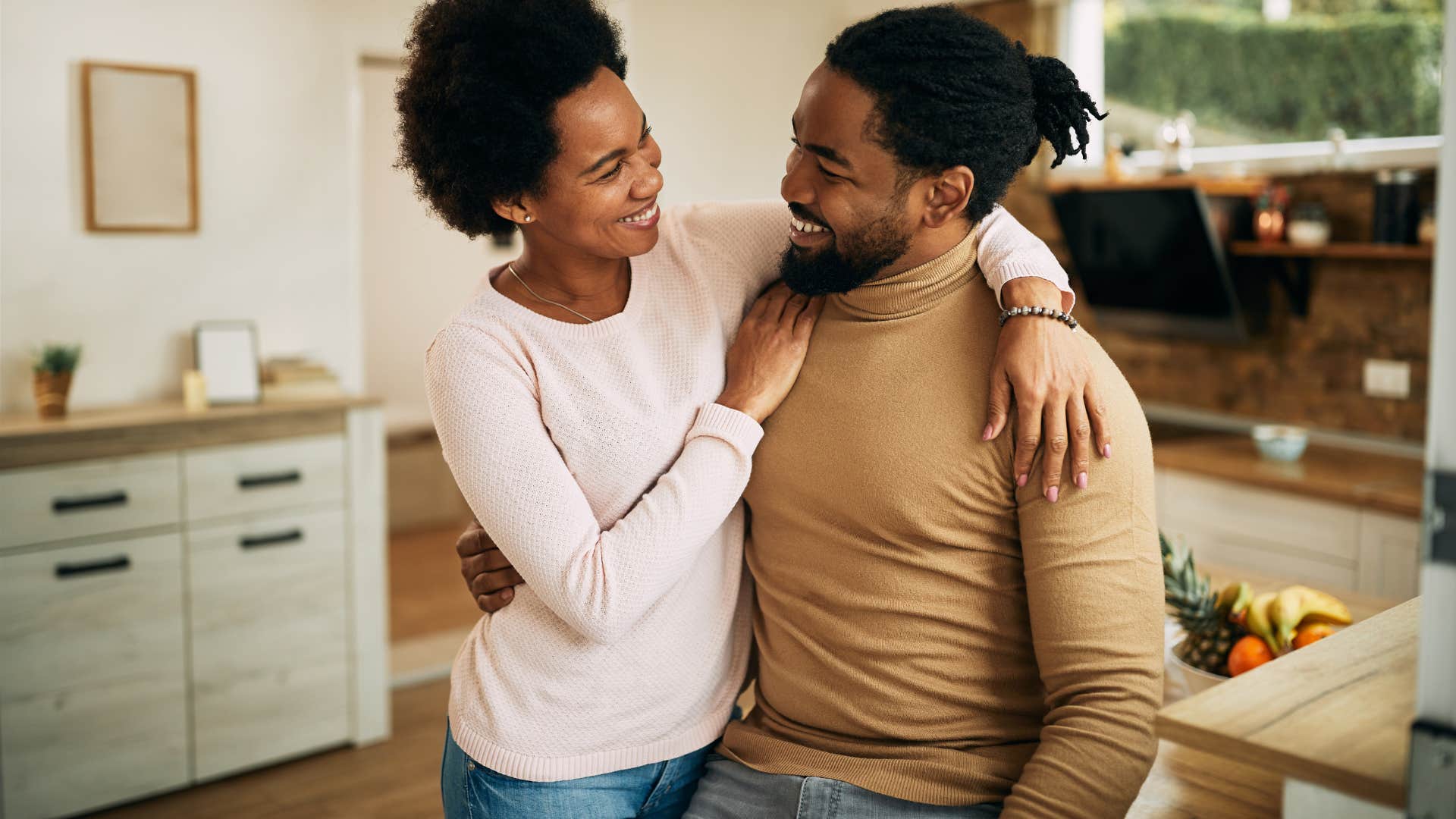 couple celebrating accomplishments together smiling