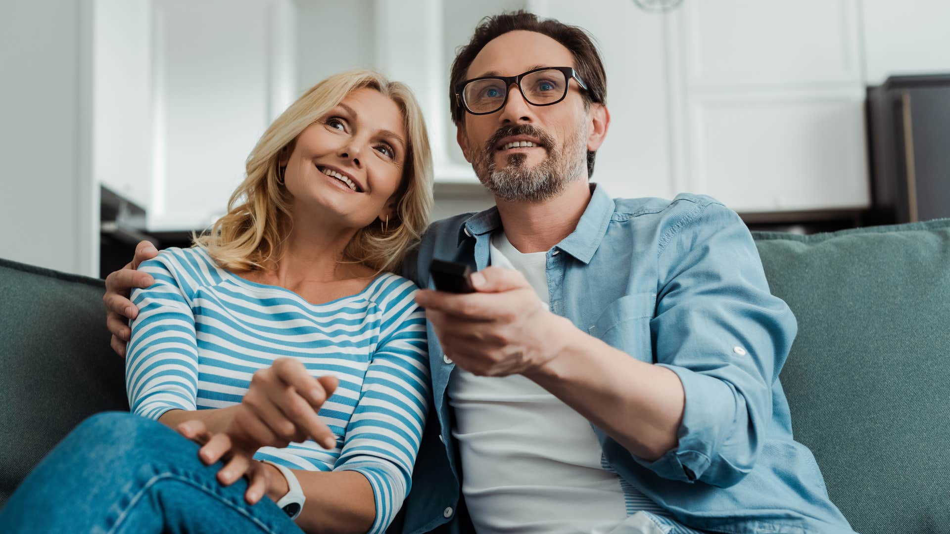 couple sitting on the couch for weekly movie night
