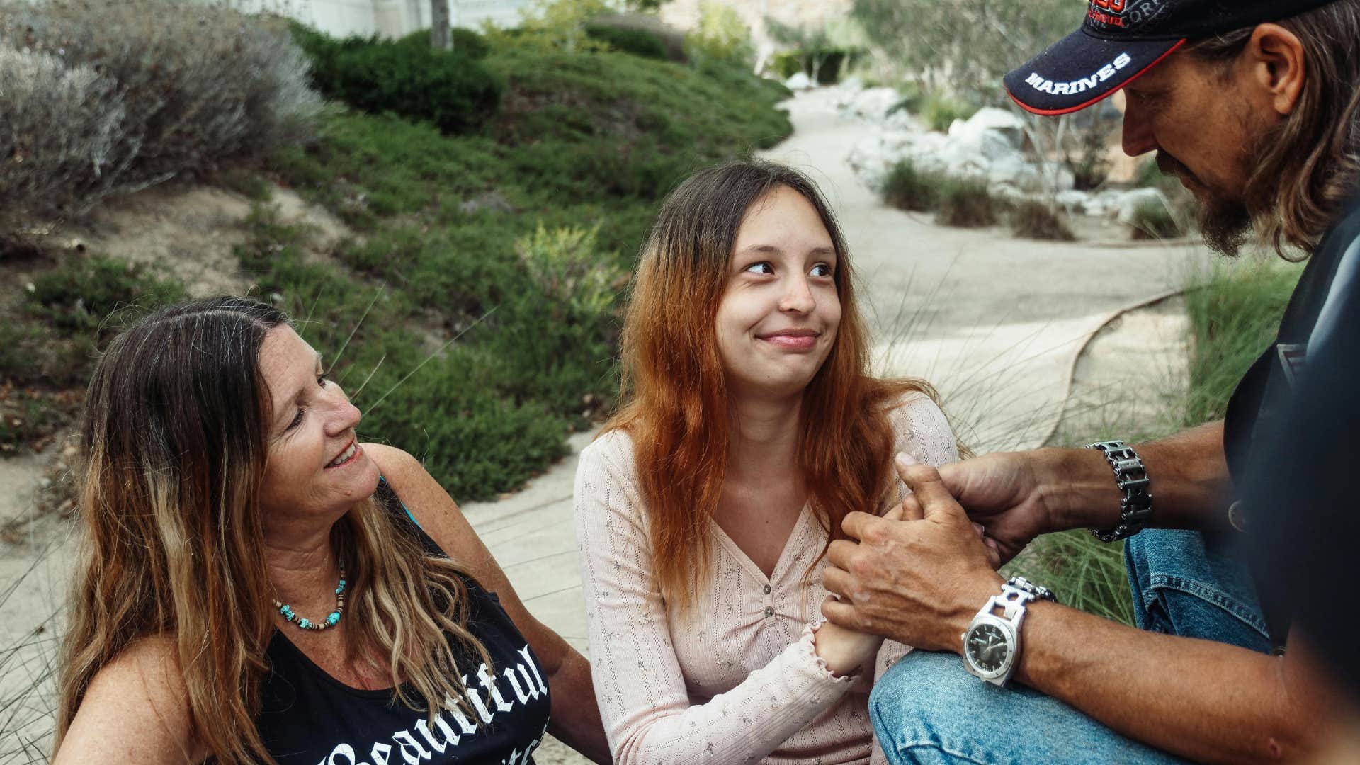 child having conversation with parents about relationship problems