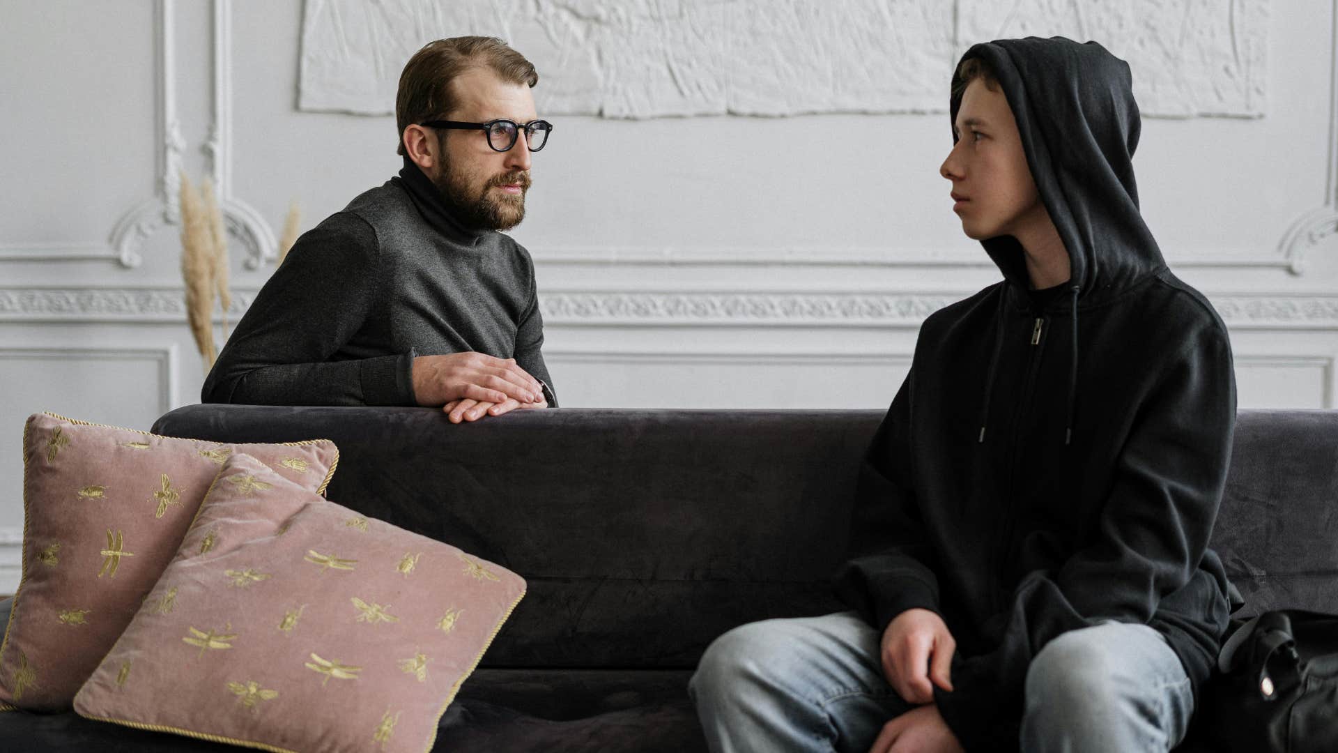 son talking to father about broken trust