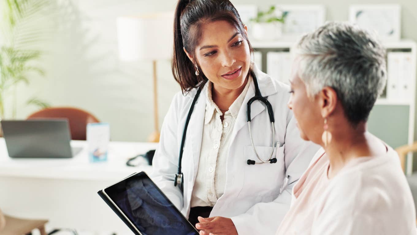 woman getting checkup at doctor's office