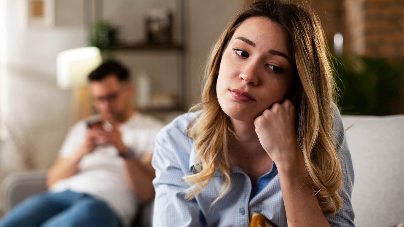 woman wondering if it's love or loneliness keeping her in a relationship