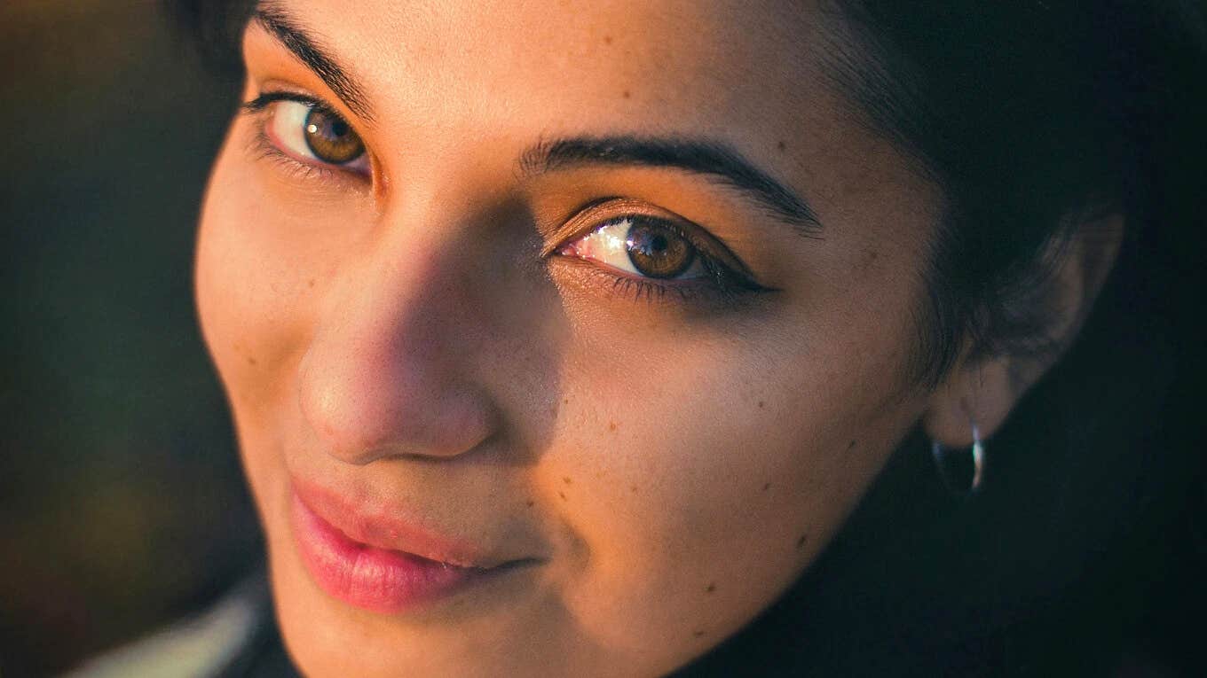 Intuitive thoughtful person showing the signs that appear when you’re going through a spiritual transformation.