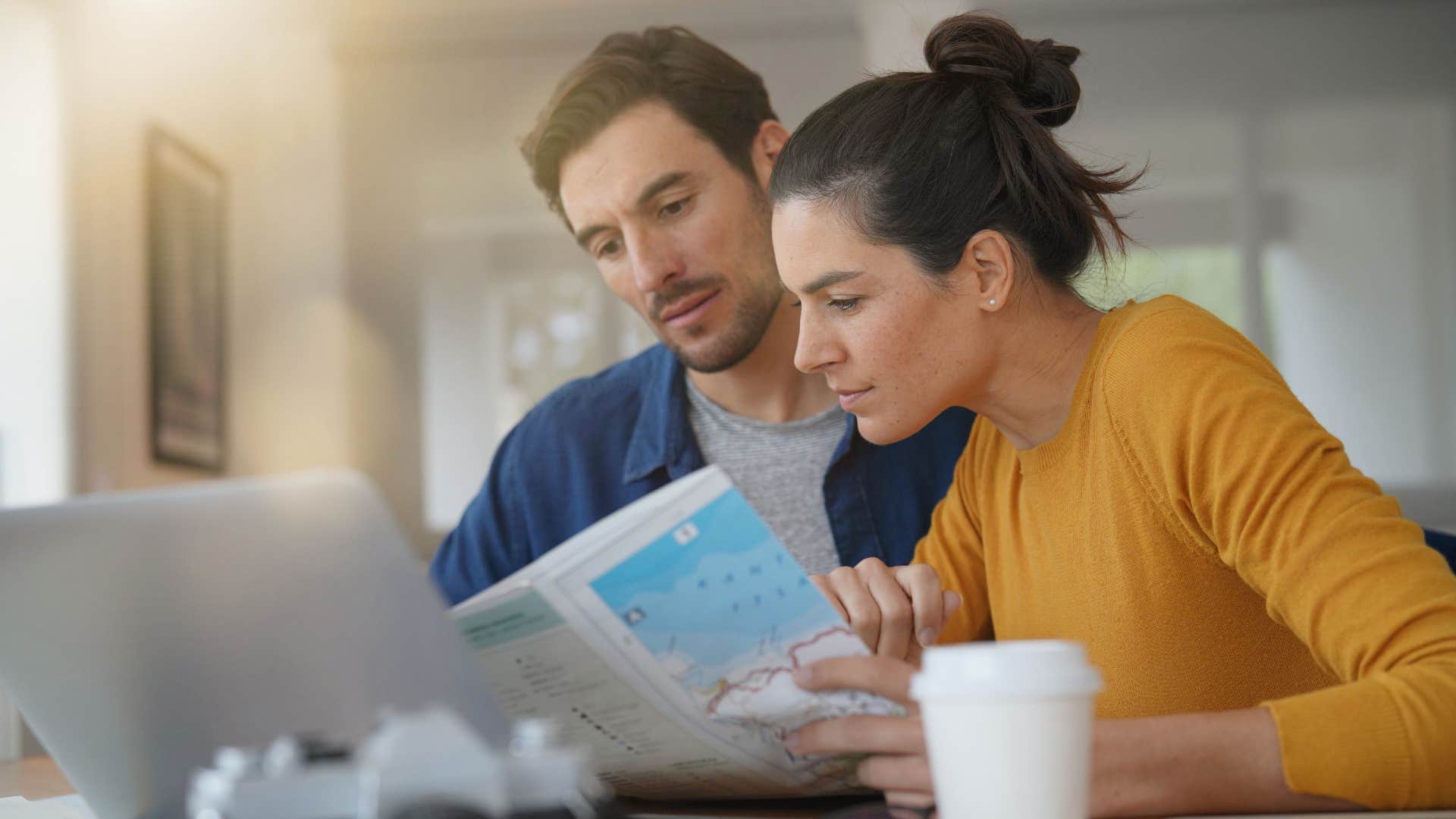 couple trying to plan vacation