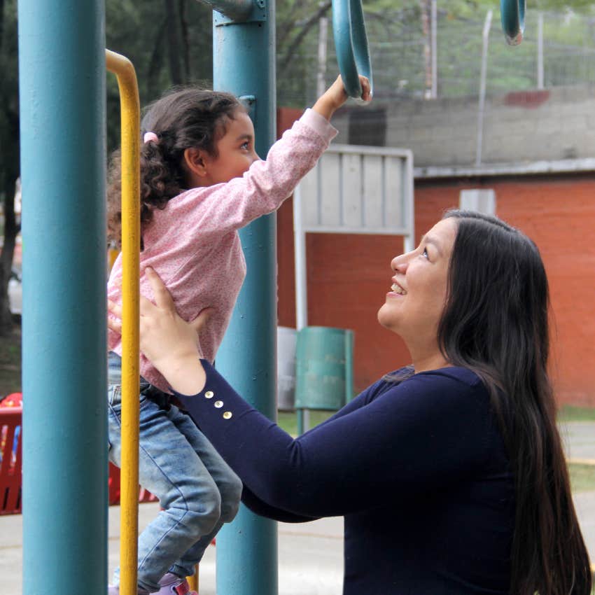 mom who is the parent of an only child as she plays but doesn't let her child win