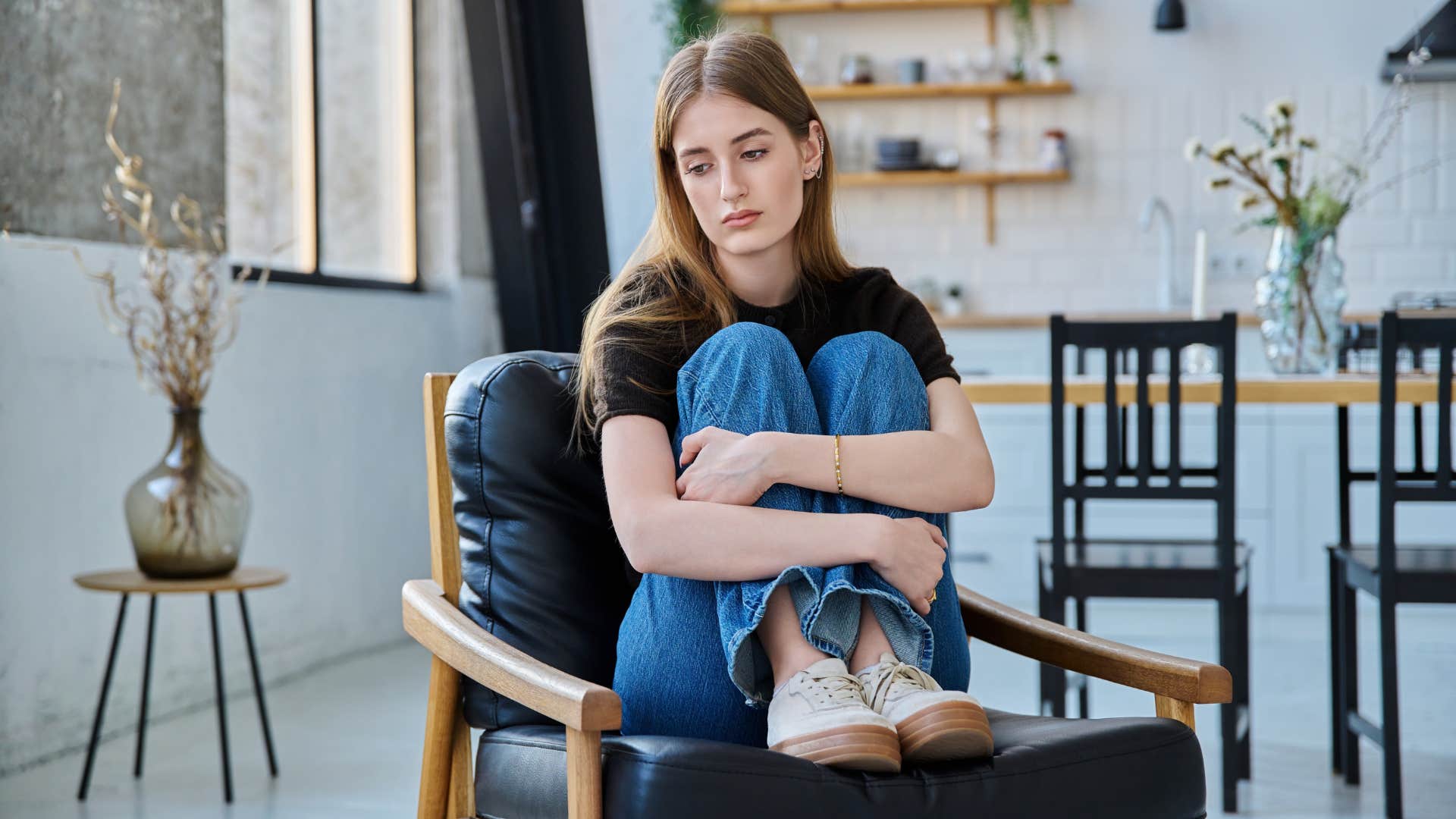 woman who has been ghosted as it heightens her fear of abandonment