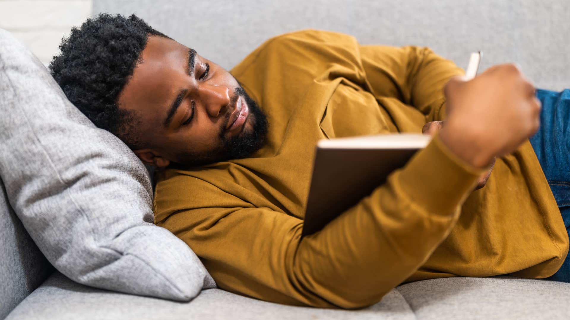 man using space to decompress by reading