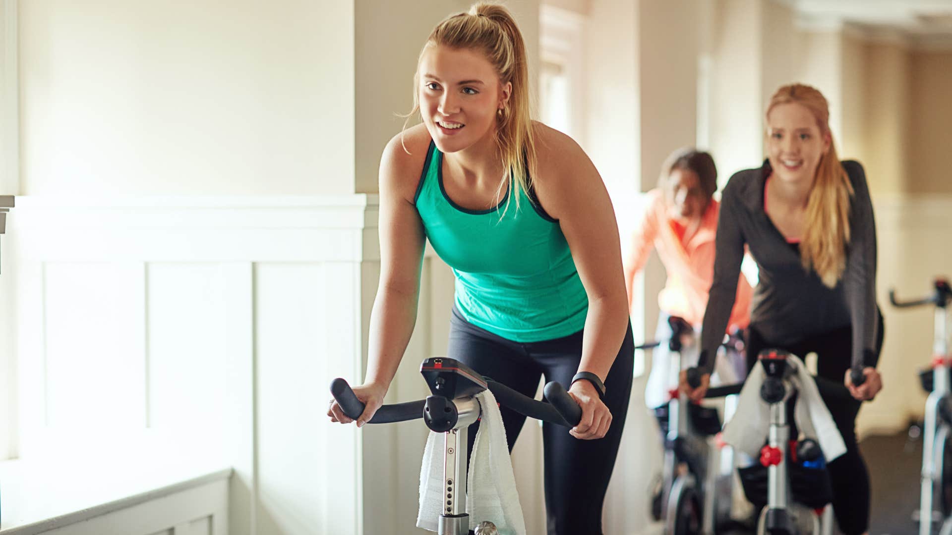 women taking a cycling class
