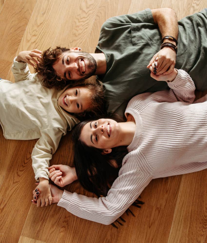 Husband wife and child united and happy