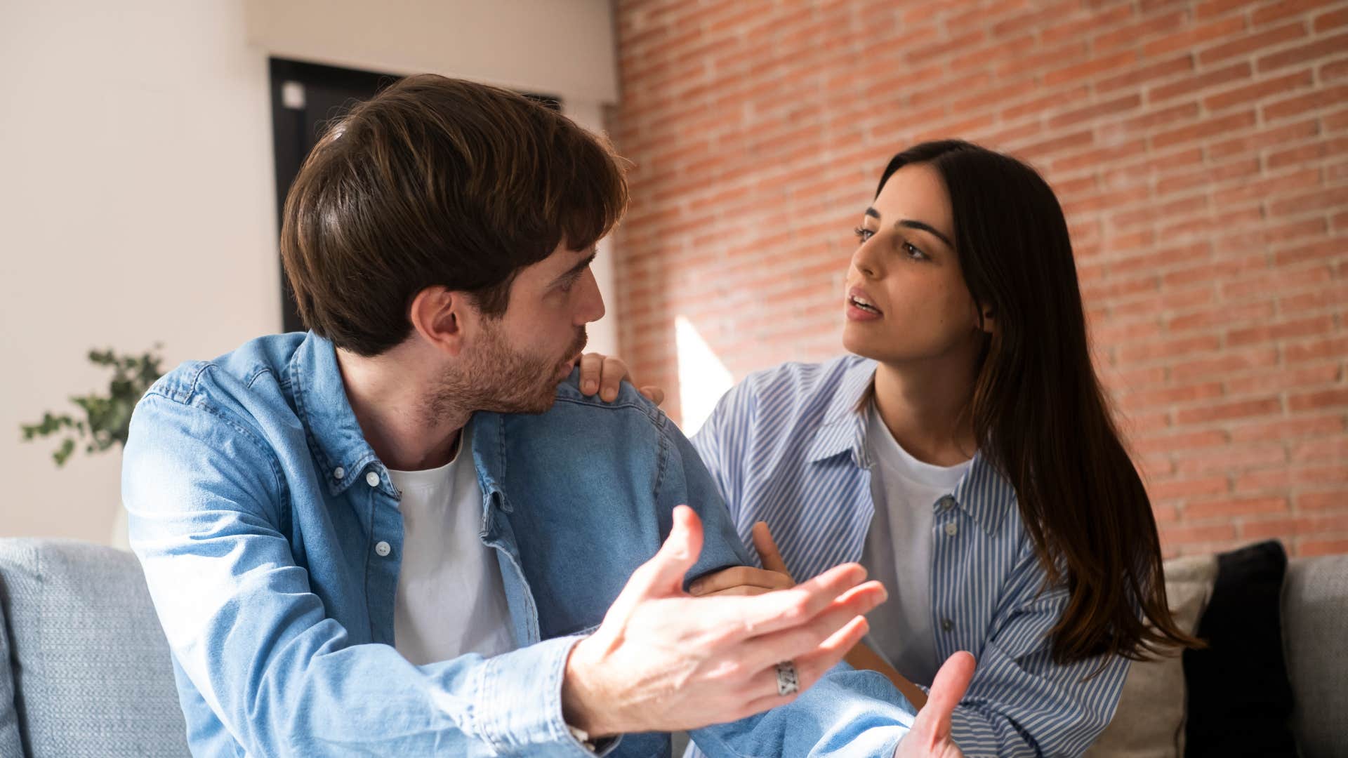 man shrugging off wife saying it's not important