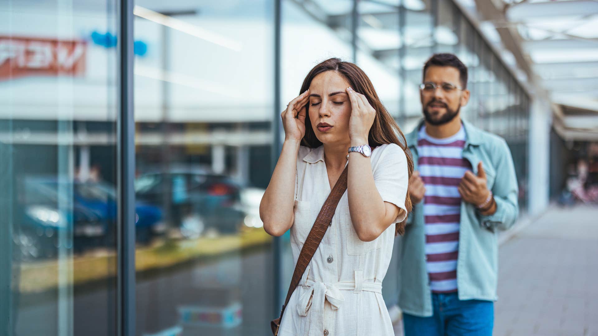 man telling frustrated woman walking away you didn't ask so i didn't mention it