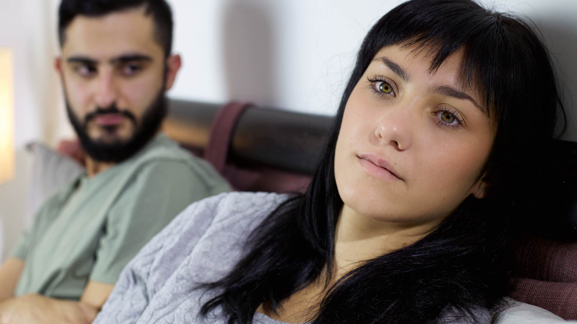 couple who's stopped casually flirting looking disconnected