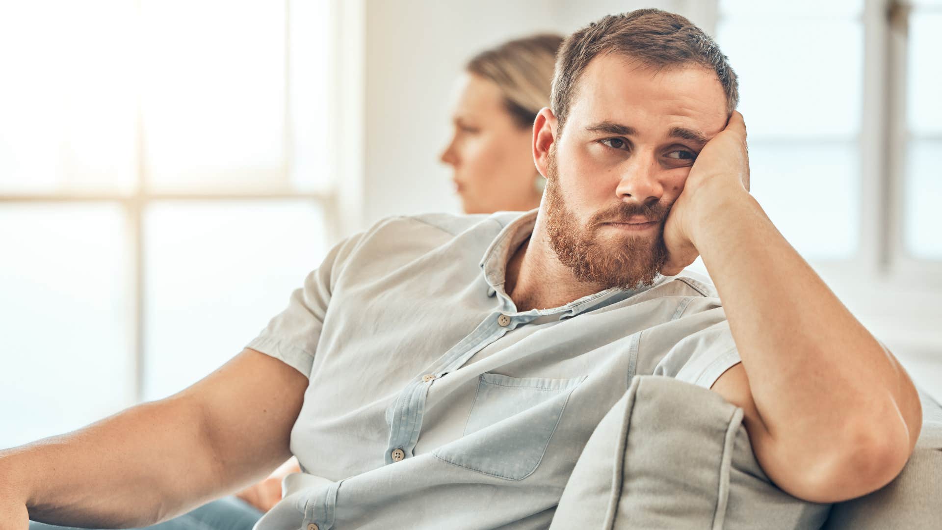 couple that's in survival mode sitting at home