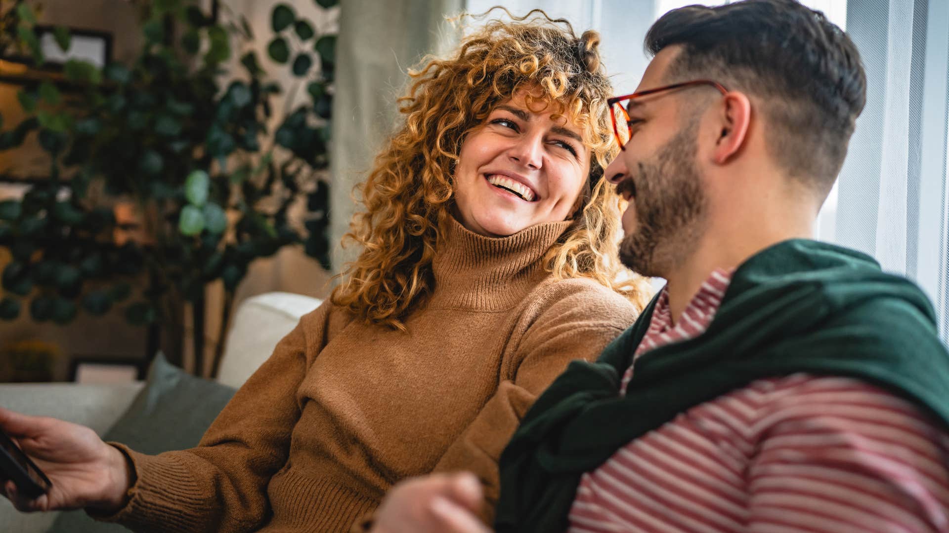 man showing up for his partner smiling