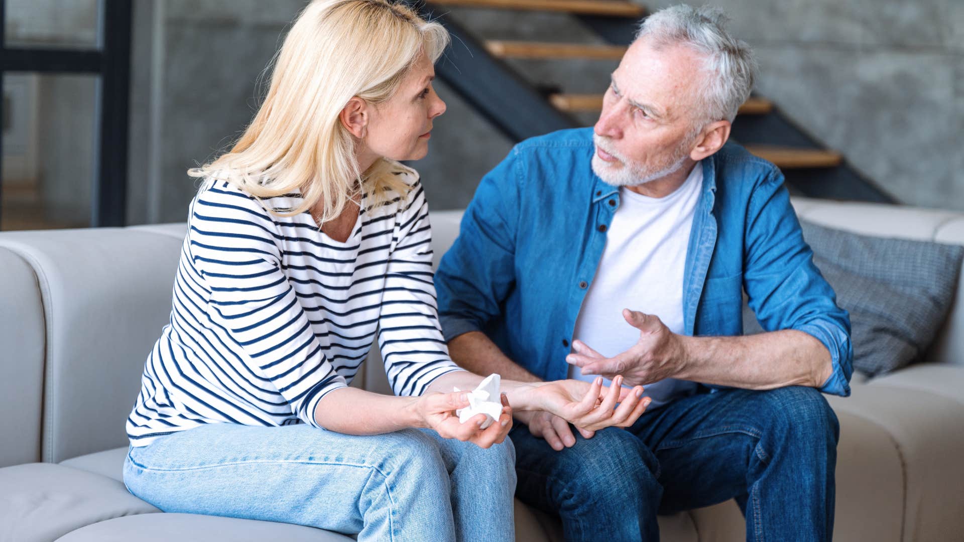older couple having a serious conversation