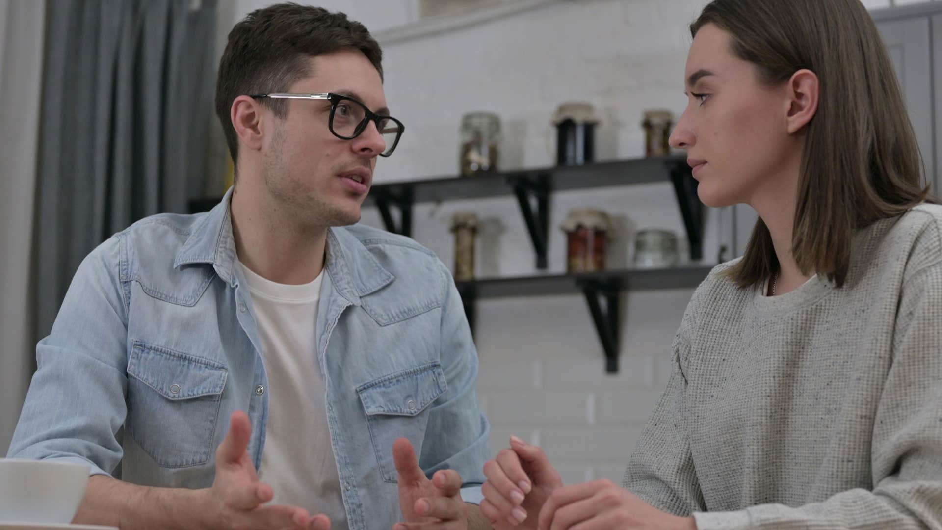 man telling upset partner they're in different places right now emotionally