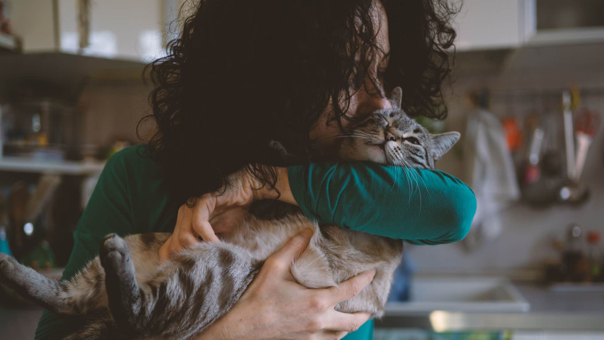 woman being comfortable with just being with cat