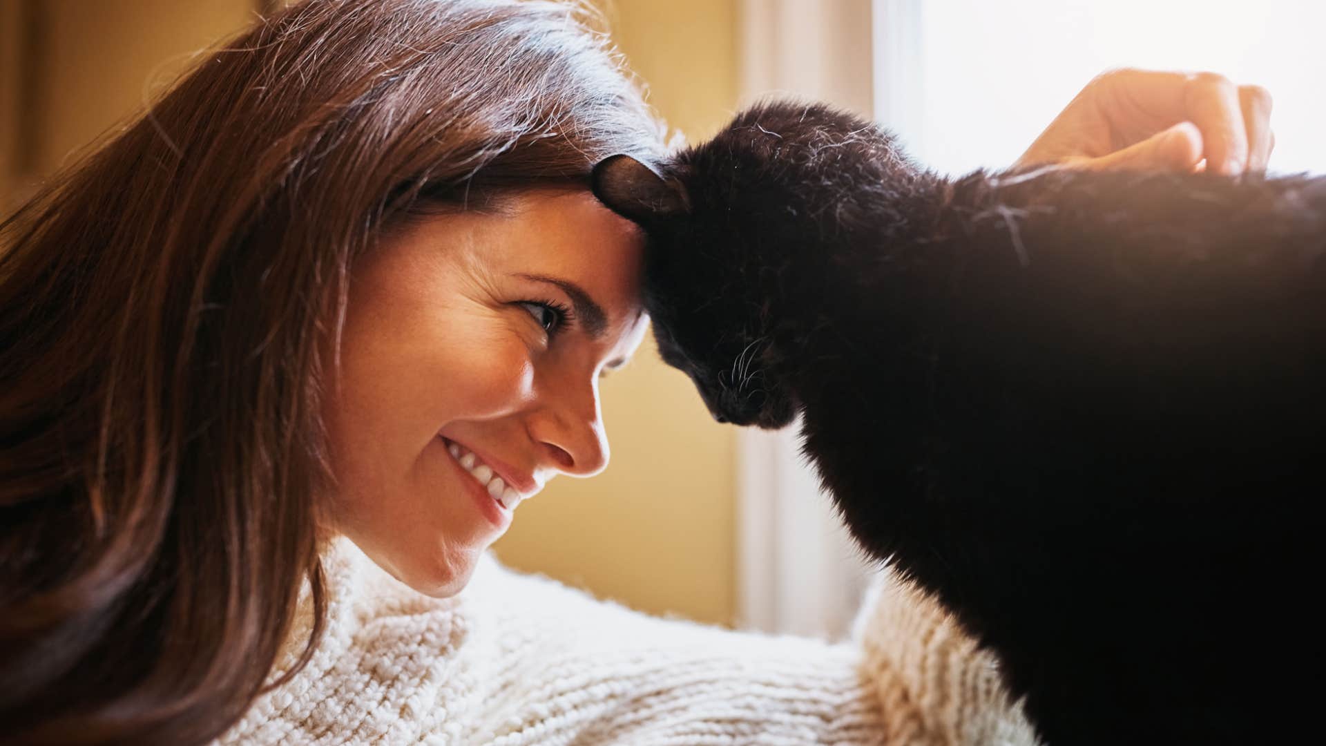 woman who is highly observant with a cat