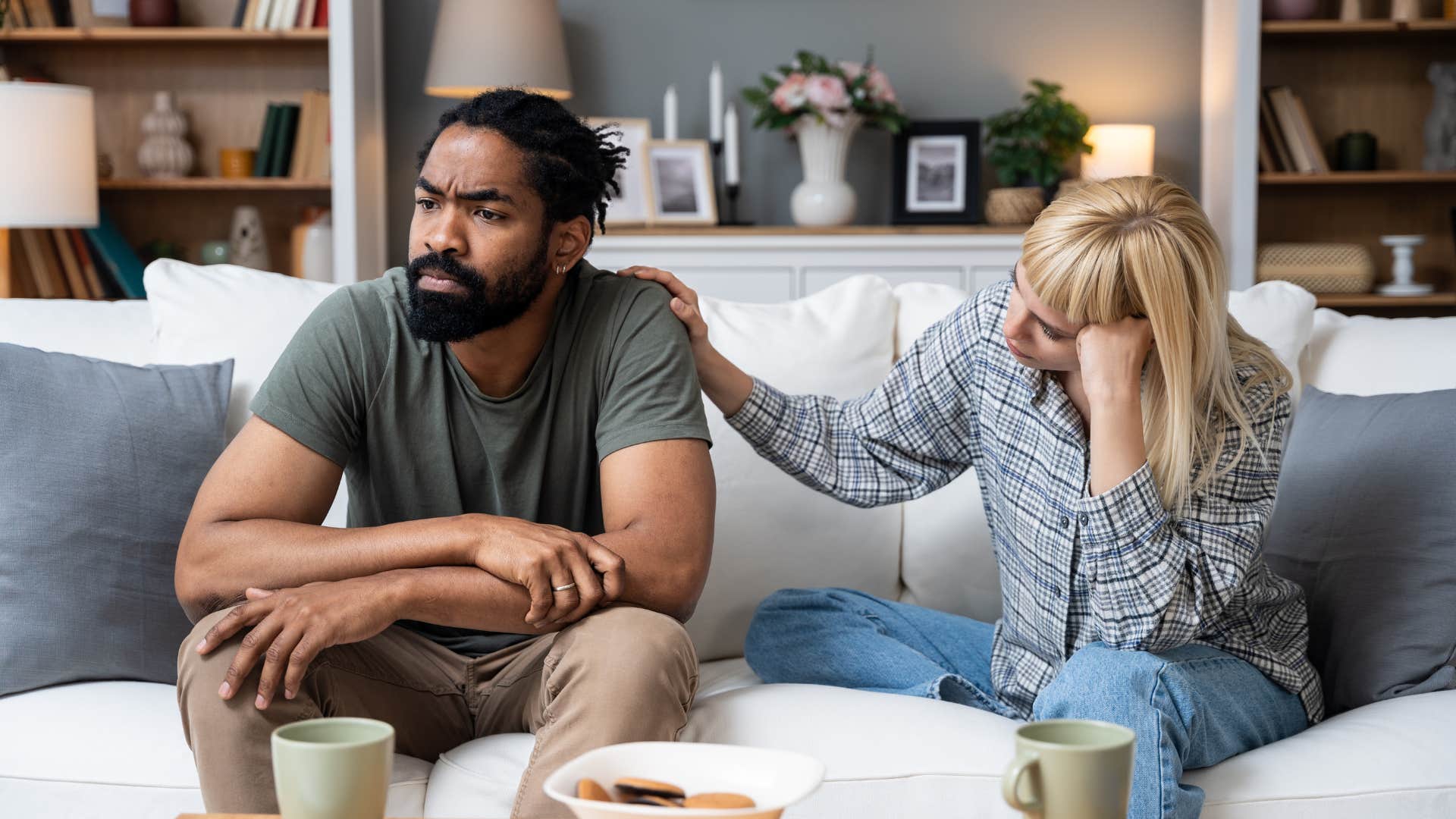 man turned away from partner ignoring her