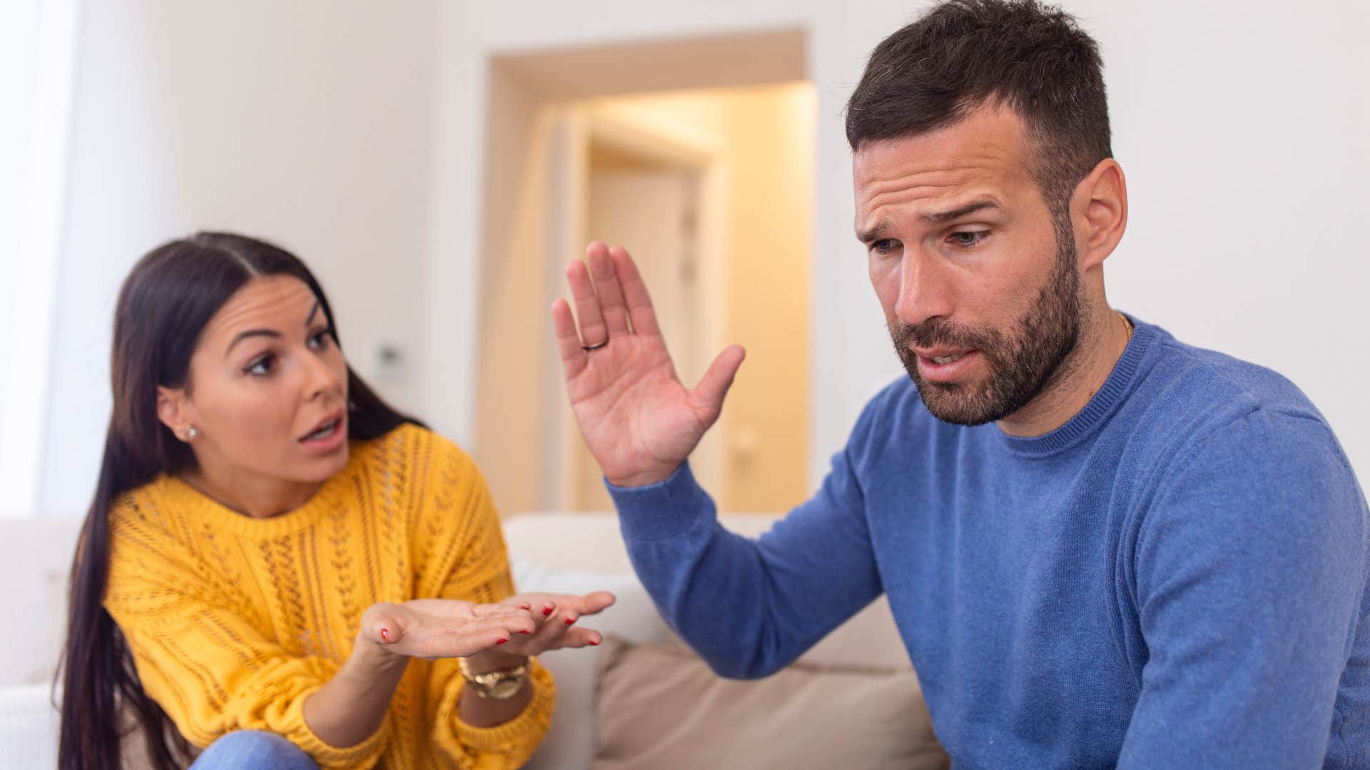 man getting defensive at wife