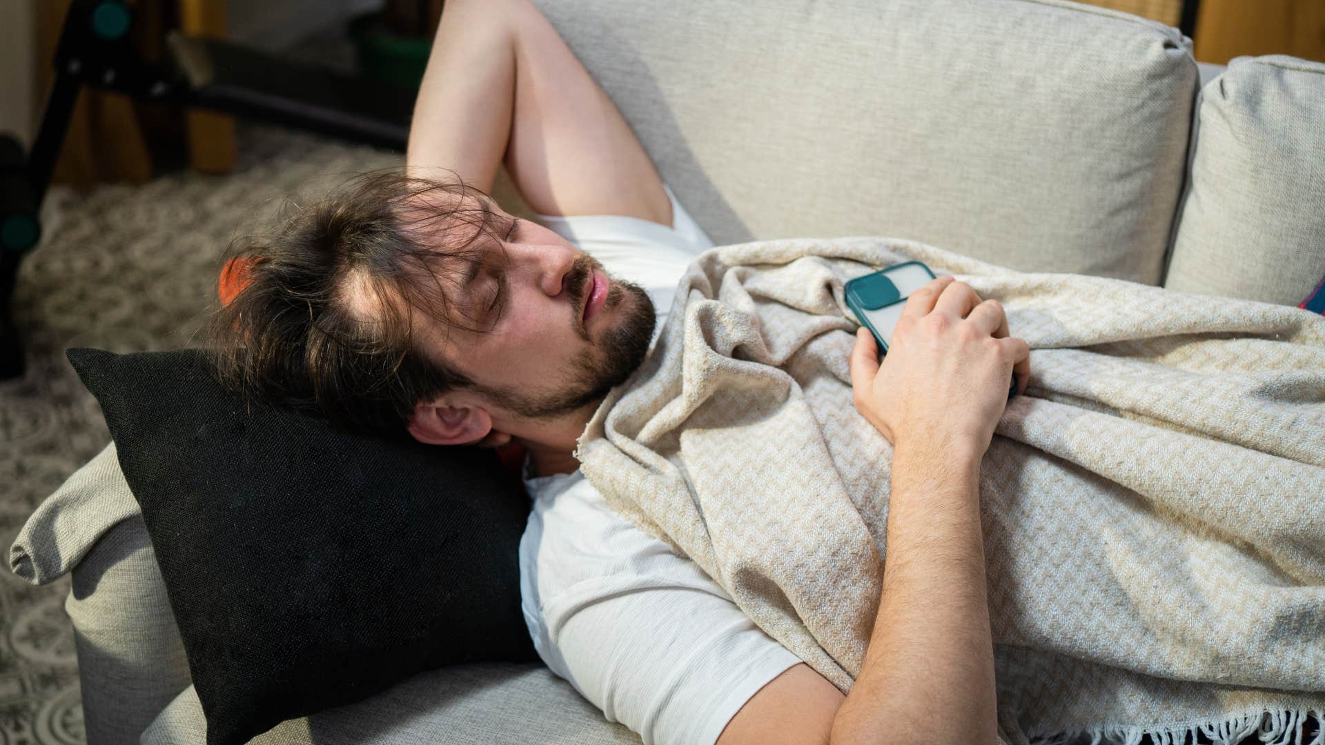 married man sleeping in another room from wife