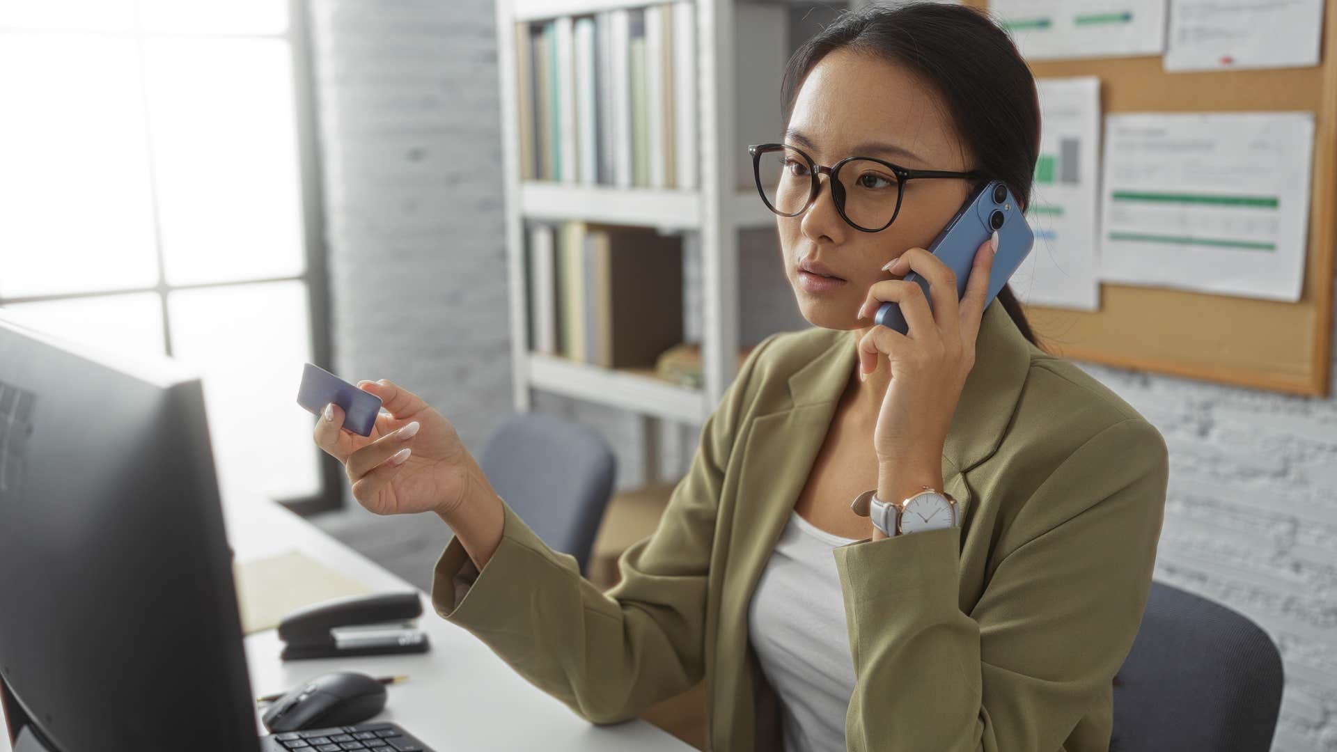 defensive woman on the phone feeling dumb for not knowing something
