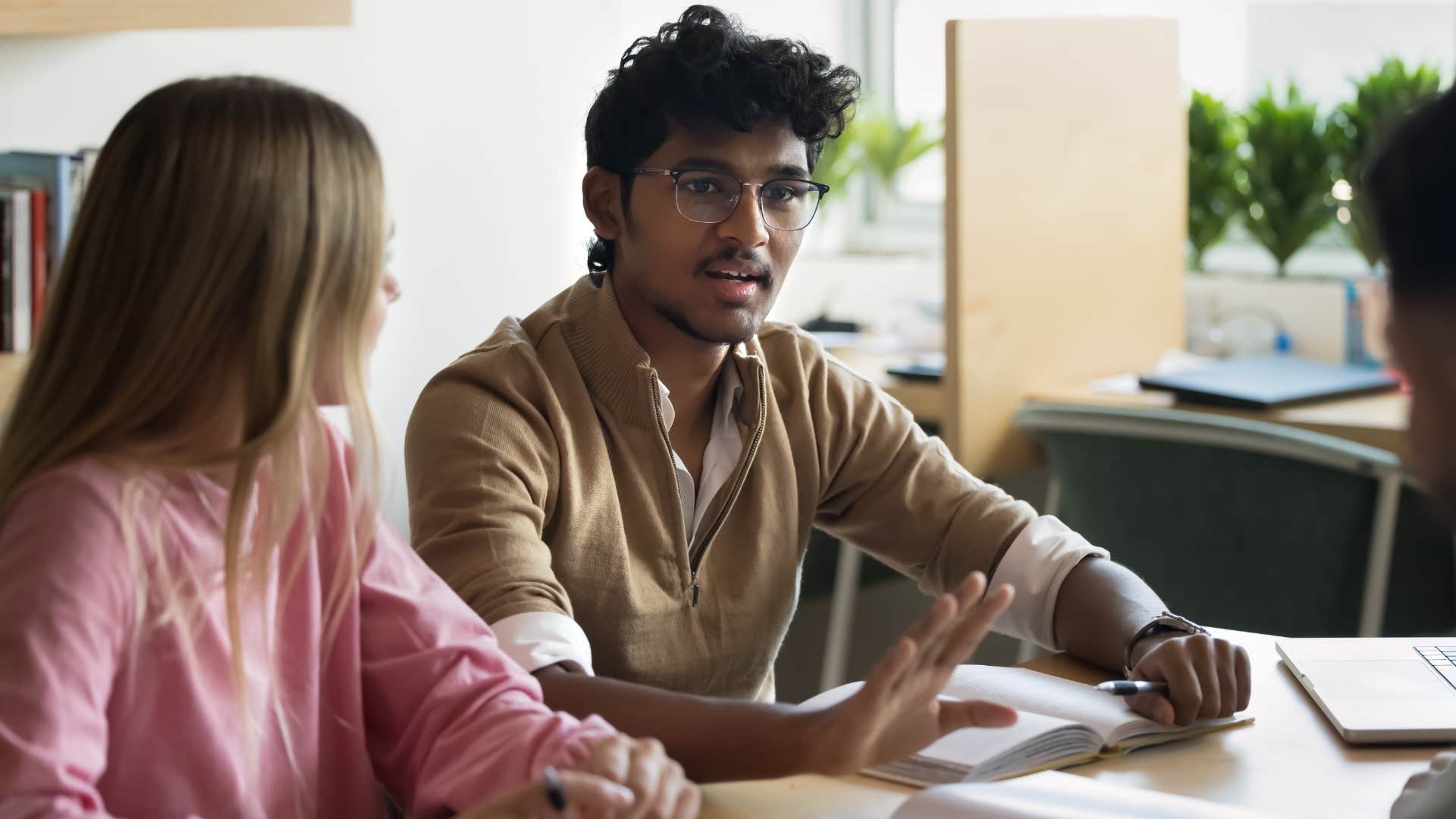 defensive man believing mistakes equate to failure during a work meeting