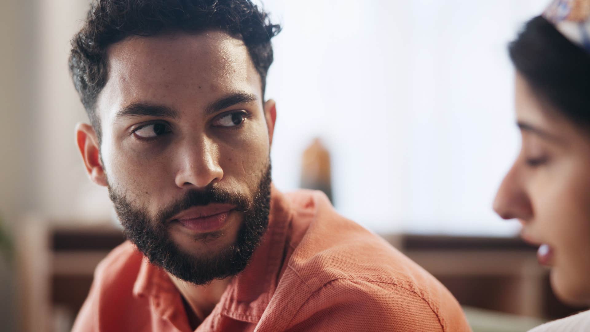 rude man saying it's not even that deep to his offended wife