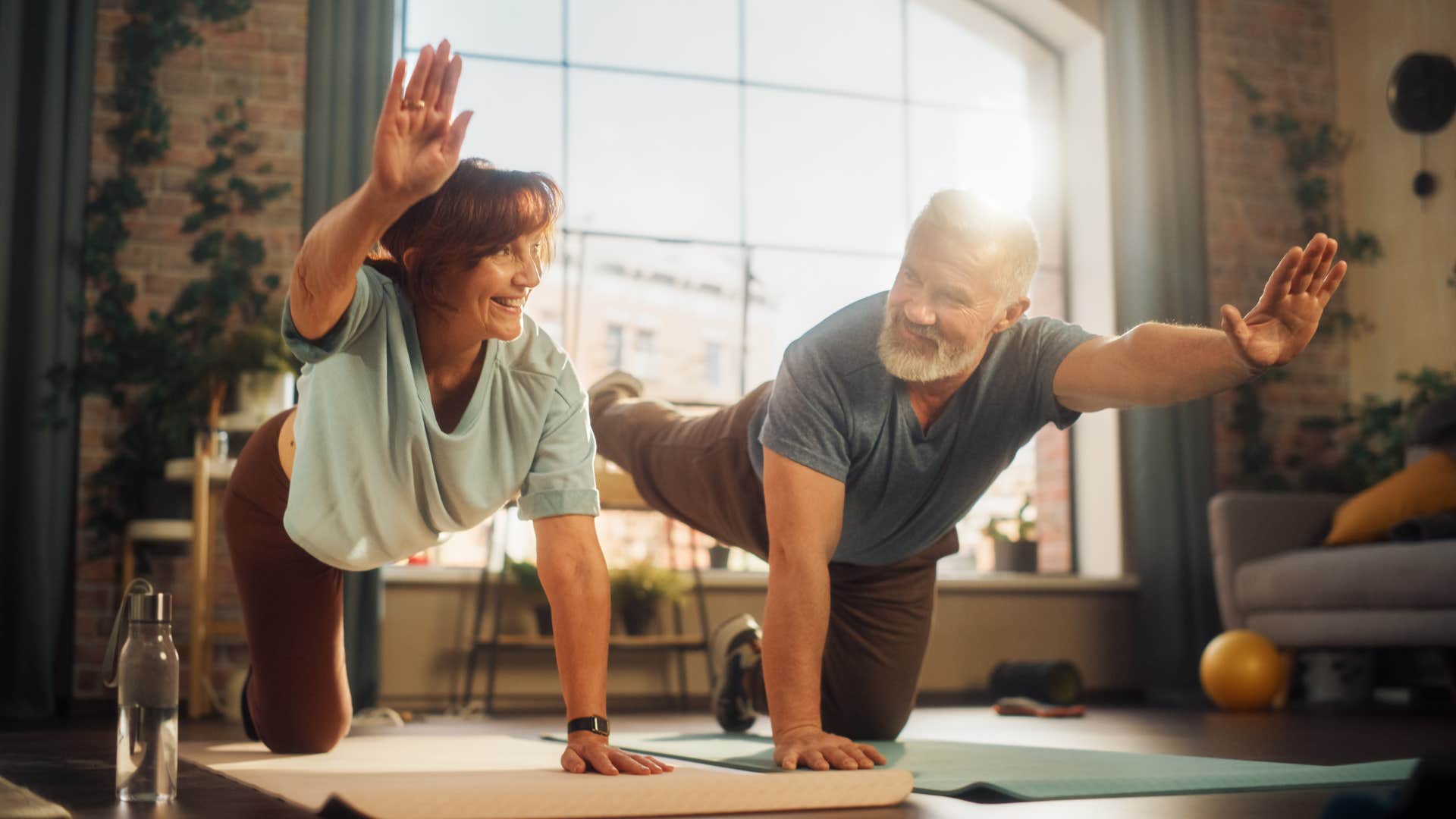 couple doing yoga together 