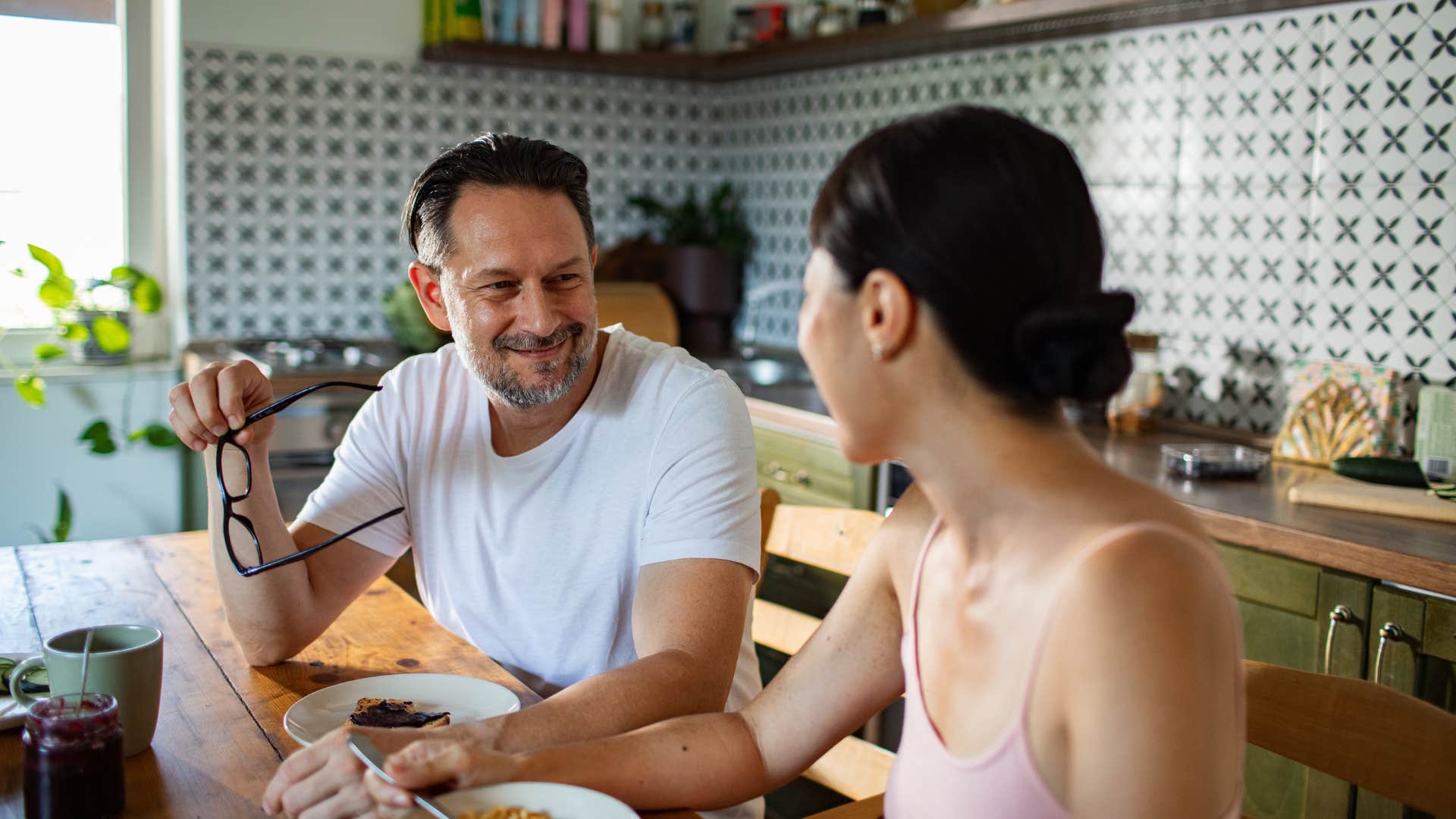 couple eating breakfast together talking about the little things