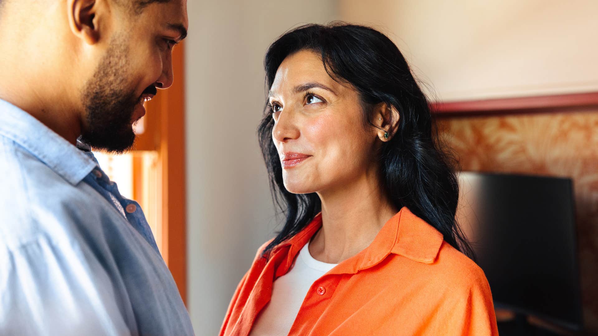 woman looking at husband trusting him with her emotions