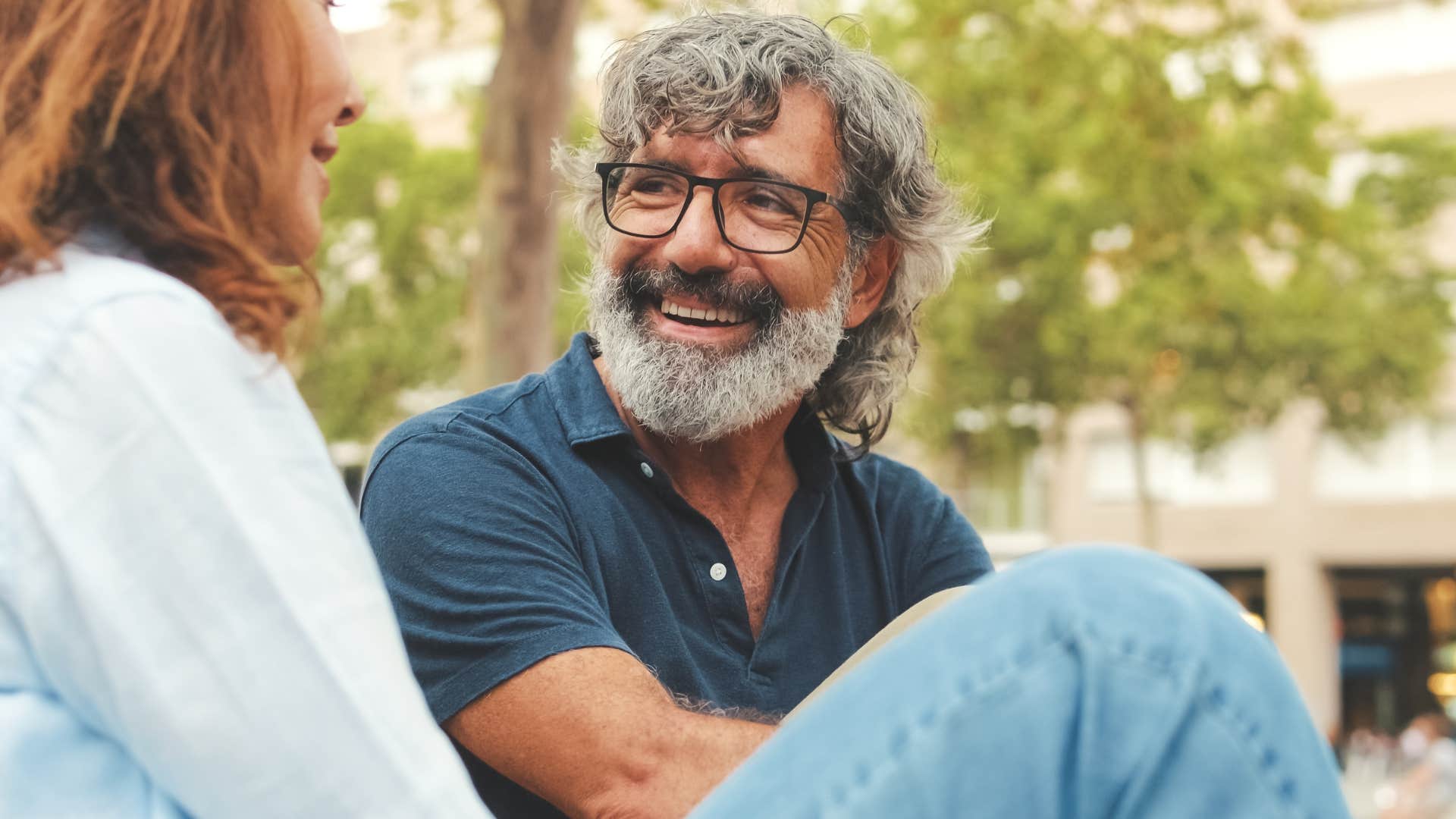 man respecting his wife's boundaries smiling
