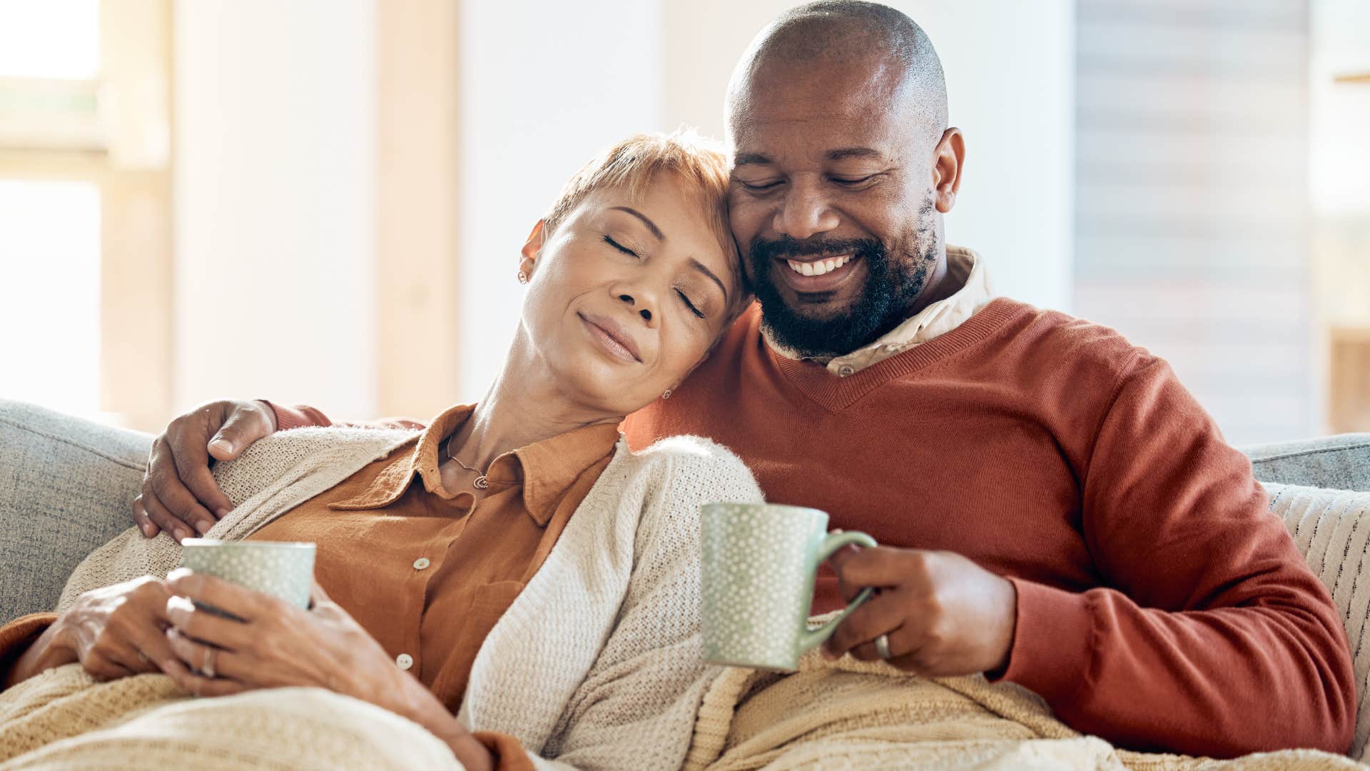 couple cuddling and talking about the future together