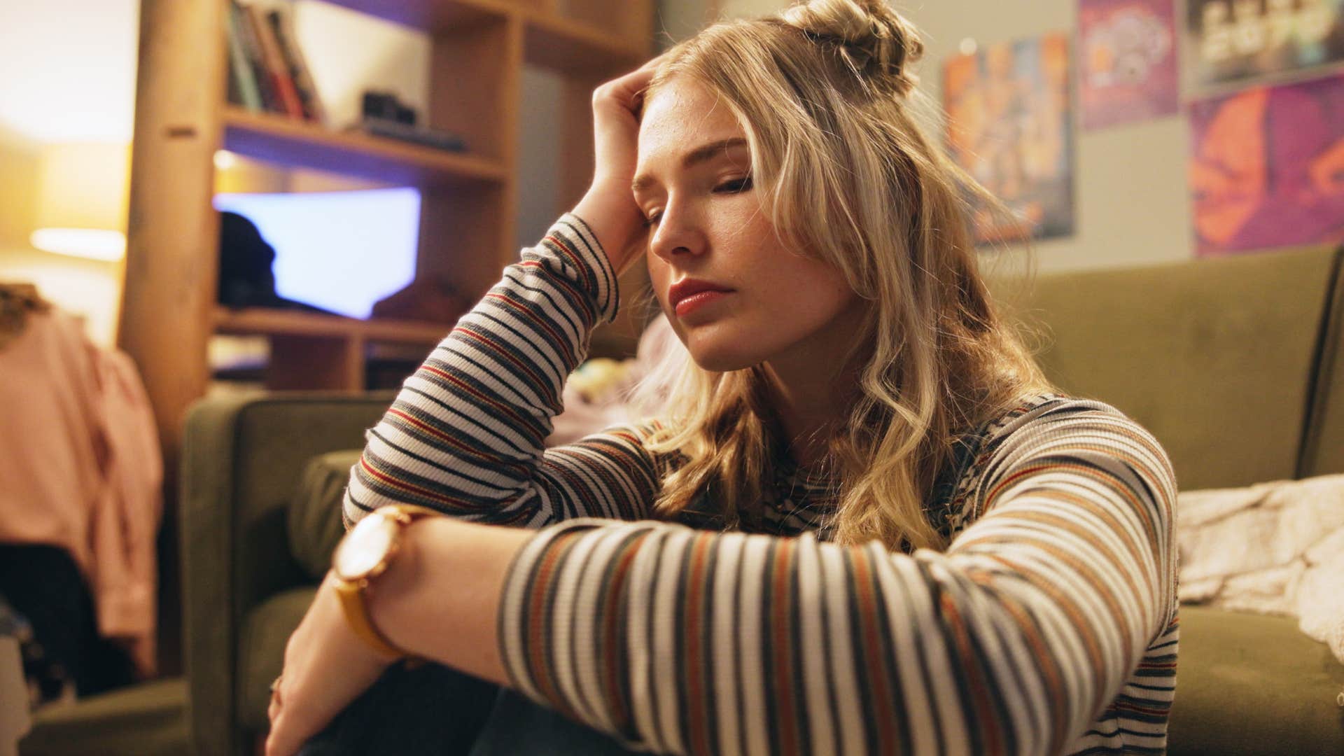 young woman grappling with shame and embarrassment