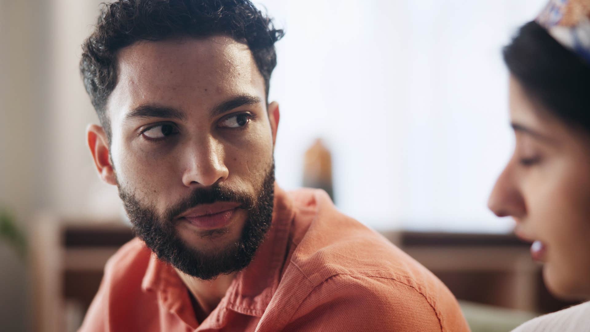 man avoiding conflict with his wife