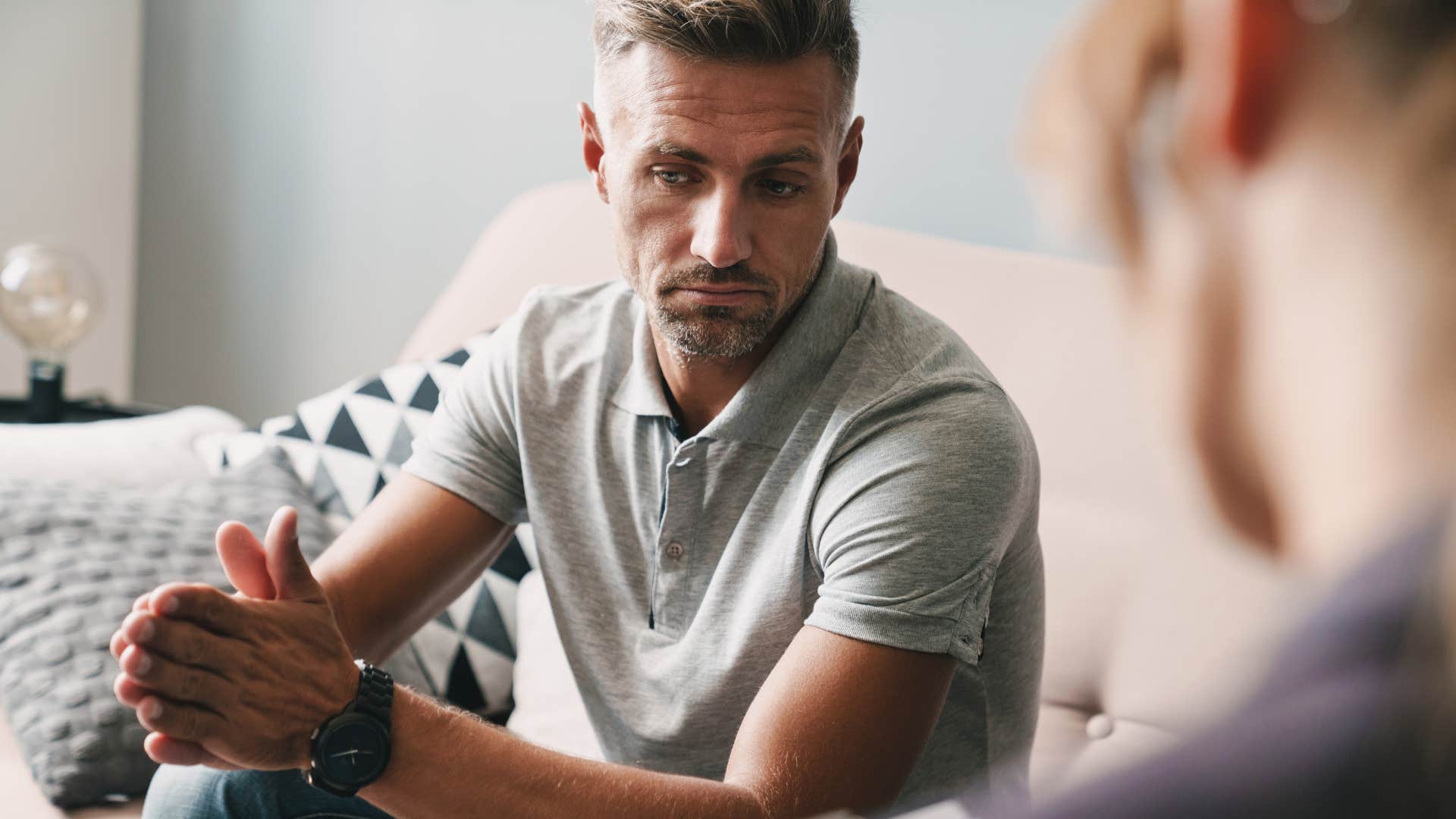 husband who tracks everything sitting with wife