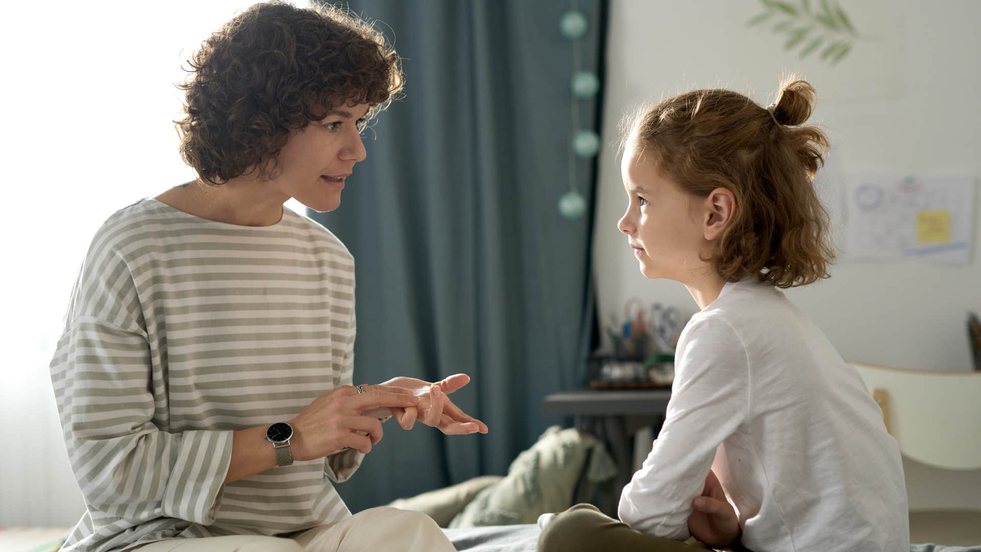 mom talking to daughter about being lazy