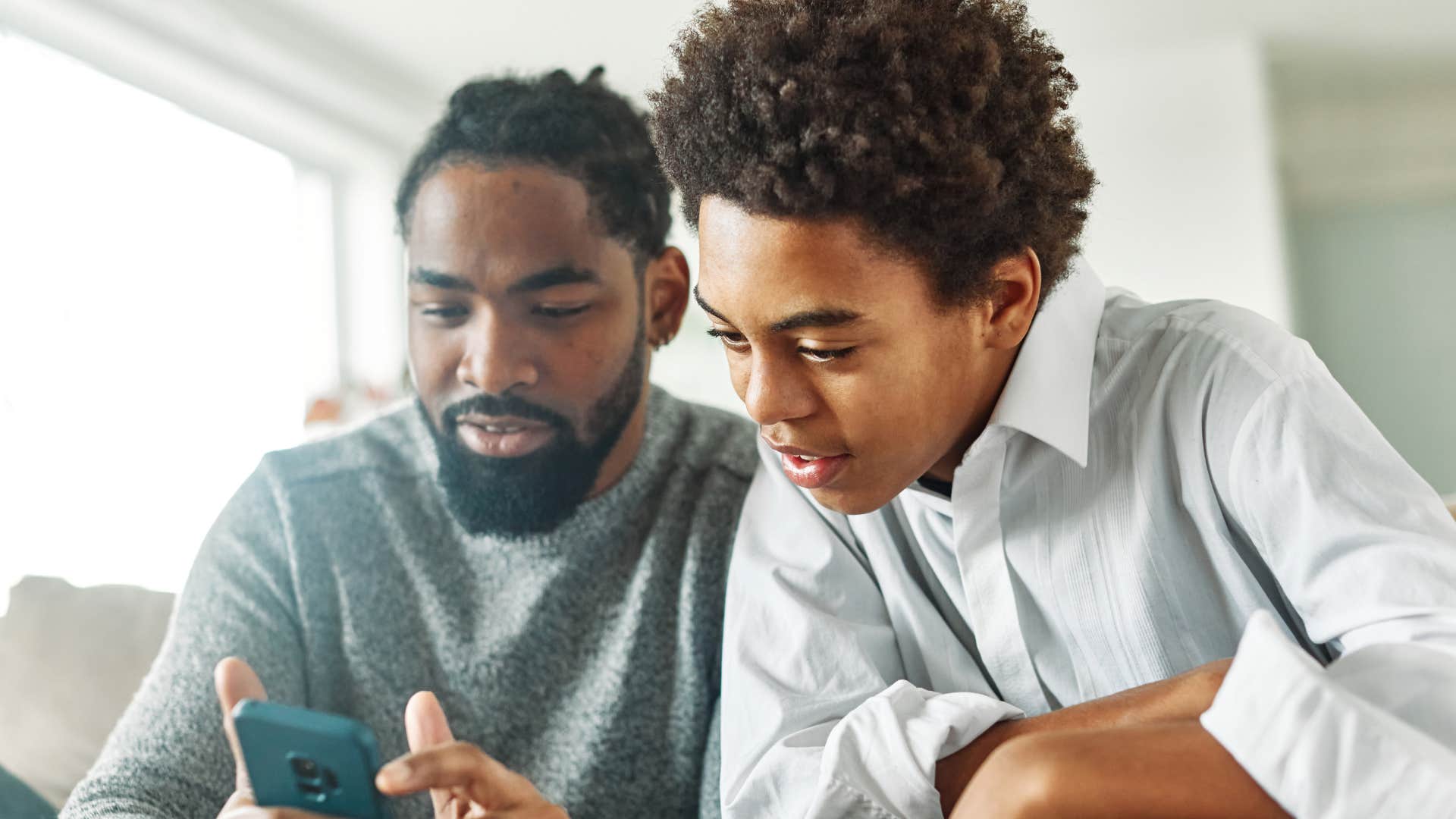 father telling curious son put it on your christmas list